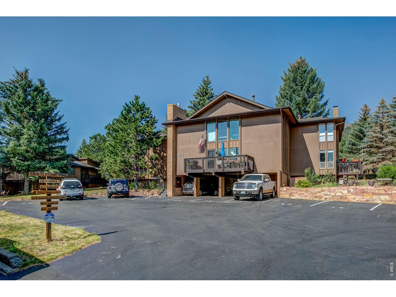 As you enter this 2-bedroom, 1.5-bath condo, you'll find it freshly remodeled with new carpeting, paint, luxury vinyl flooring, and sparkling white quartz countertops. This quiet retreat shares only one common wall, offers two designated parking spaces, and features a common area perfect for larger gatherings. HOA dues cover many of your maintenance expenses, including trash, water, sewer, snow removal, road maintenance, deck and roof repairs, and exterior painting. It's a short walk from your front door to the Estes Park 18-hole championship golf course, where you'll enjoy panoramic views of Mt. Meeker and Longs Peak. Less than a 15-minute walk away is the charming town of Estes Park, offering dozens of shops and restaurants. The nearby Estes Valley Community Center provides year-round activities, a large indoor pool, gymnasium, fitness classes, and a fully equipped fitness center. Your new home is also just minutes by car from the entrance to Rocky Mountain National Park, with some of the country's best hiking, fishing, and camping. Come home to sip an evening cocktail or enjoy your morning coffee from either of your two private decks. As a first or second home in the perfect Colorado mountain setting, offering the best of small-town living and mountain adventure, this is it. Within this highly desirable golf course community, several homes have sold for more than $1 million over the past two years, making this condo an exceptional value. Act now to take advantage of today's market and purchase this move-in-ready home in excellent condition for just $335,000. Next year may be too late.
