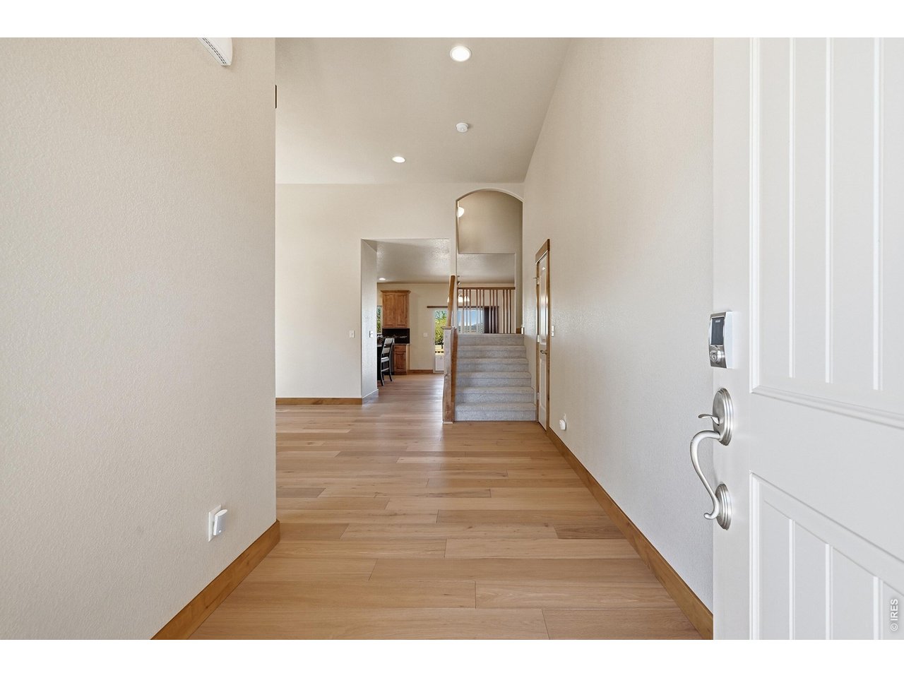 If breathtaking, unobstructed sunset views are on your wish list, this home delivers. This beautiful 4-bedroom, 3.5-bath home offers a thoughtfully designed open floor plan that is both inviting and functional. Move-in ready, the property features a brand-new roof, fresh interior paint, new flooring throughout the main level, and plush new carpeting upstairs.The kitchen is the heart of the home, featuring a spacious pantry, abundant cabinetry, and a large island that's perfect for everyday living and entertaining. Adjacent to the kitchen, you'll find a charming dining nook as well as a formal dining room, ideal for hosting family and friends. The cozy fireplace creates a warm and welcoming gathering space.The primary suite offers a private retreat with an expansive walk-in closet and a luxurious five-piece bath. Each additional bedroom is generously sized and includes either a walk-in closet or ample storage. The oversized three-car garage comes equipped with a pre-installed EV charger, adding modern convenience for electric vehicle owners. The unfinished basement features 9-foot ceilings, creating an open, spacious feel and providing endless opportunities for future expansion and customization.Ideally located within walking distance of Bethke Elementary and just moments from the neighborhood pool, this home also offers convenient access to shopping, dining, scenic walking trails, and I-25, with Fort Collins just minutes away. Situated within the highly sought-after Poudre School District, known for its top-rated schools, this home truly offers the perfect combination of comfort, convenience, and community.Don't miss your opportunity to make this exceptional property your own.
