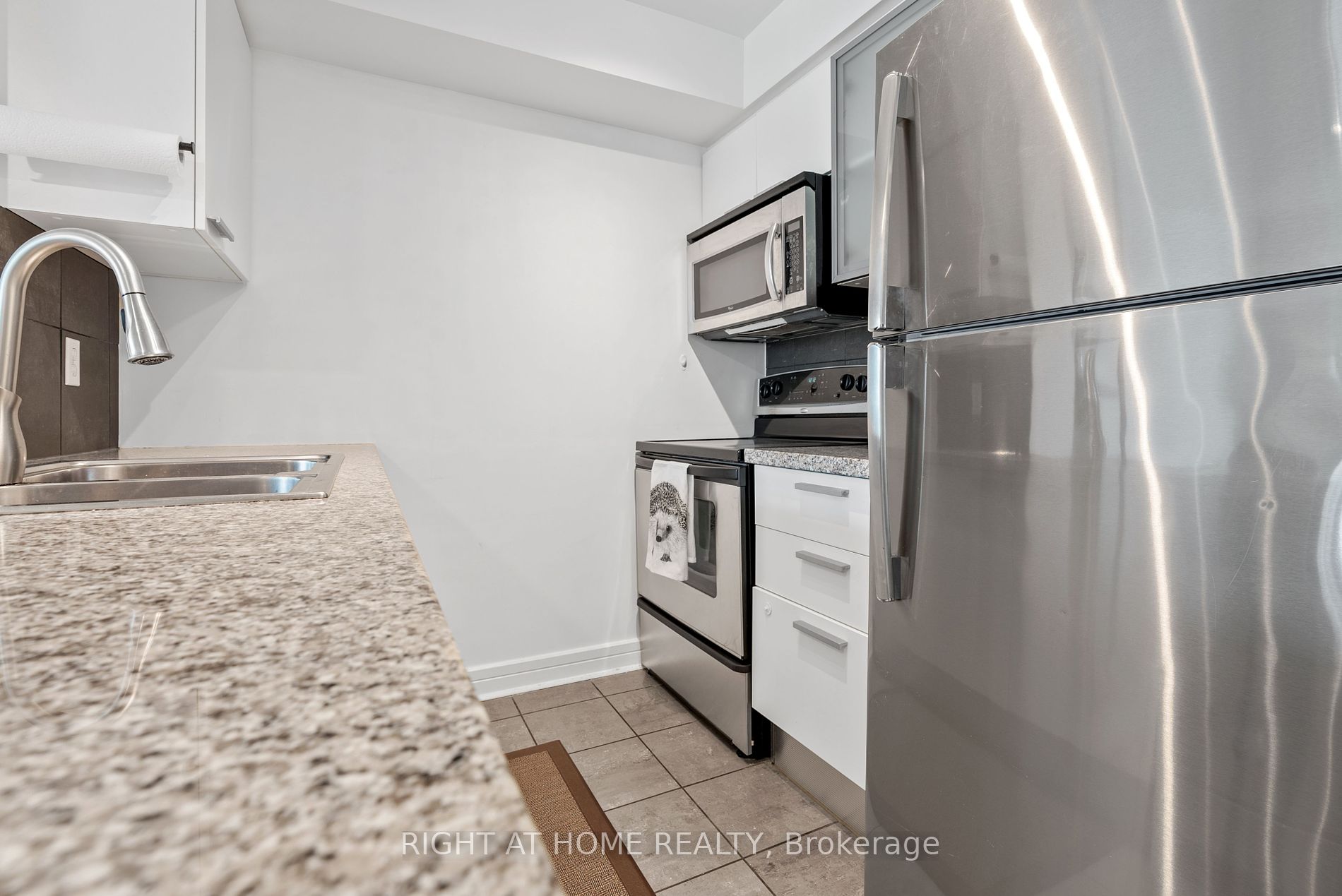 16 Harrison Garden Blvd 209