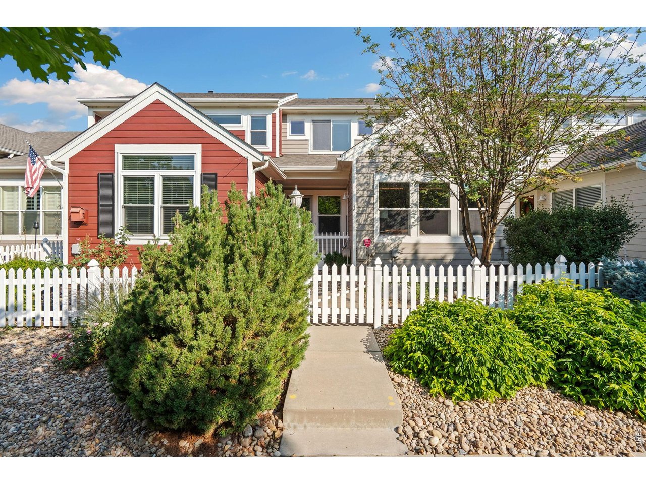Welcome to 4061 Temple Gulch Circle, an inviting lock-and-leave home overlooking beautifully landscaped, HOA-maintained green space with mature trees. A clean, south-facing courtyard creates a welcoming first impression, while the open floor plan, vaulted ceilings and abundant natural light make the interior feel bright and spacious. The living room features a gas fireplace, ceiling fan and three large windows, with an adjoining dining area for comfortable everyday living and entertaining. The U-shaped kitchen offers granite countertops, maple cabinetry, a newer composite sink, custom tile backsplash and newer appliances, including a stainless steel refrigerator. A generously sized powder bath completes the main level. Upstairs, the large, light-filled loft provides valuable flex space for an office, reading area, hobby space or second living room. The spacious primary suite features a vaulted ceiling, ceiling fan, large walk-in closet and private bath with separate tub and shower, raised double vanity and private water closet. A second bedroom and full bath complete the upper level. The clean basement includes laundry hookups, an egress window, insulated walls and excellent storage or future expansion possibilities. Enjoy a private alley-load two-car garage and convenient access to shopping, dining, schools, entertainment, Medical Center of the Rockies and Highway 34. Monthly HOA dues are $397.49. Easy to show and ready to welcome its next owner!