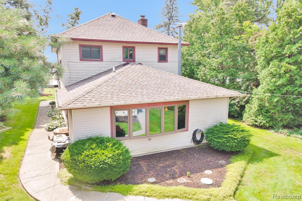 Estate Sale, North Channel/St. Clair River/Lake Saint Clair Waterfront, This Home offers 5 Bedrooms, 2 Full Bathrooms, a Detached 2.5 Car Garage with Electricity, Garage Door Opener and Side Door Entry.  Cement Driveway is wide enough for 6 to 7 Vehicles.  ***FEMA Letter of Map Amendment Determination Document, Flood Zone X, No Flood Insurance Required. Plenty of water views from the many windows in the Home.  Stamped Concrete Patio and Walkways.  Large Backyard with 61 Foot of Seawall.  Extensive Wooden Deck and Pier for Water Access.  The Open Floor Plan gives you Water Views from the Family Room, Kitchen, Dining room, Great room (with a Wood Burning Fireplace) and the Sitting/Sunroom.  Walking distance to the Board Walk, Harbour Club and the many other Venues Algonac has to offer.  Boating, Hunting, Fishing and Loving Every day in this Amazing Community.  Minutes from the Harsen Island Ferry and the Walpole Island Ferry.  Every day is a Vacation in this Golf Cart Friendly Community. Algonac has Multiple boat Launches and Many Events along the Waterfront to include Outdoor Concerts.  Algonac has 5 Parks, almost 17 Acres of Open Recreation to include gazebos, splash parks, playgrounds and a New Built inground Pool.  Existing Appliances Included: Refrigerator, Gas Oven Range, Dishwasher, Microwave, Washer and Dryer. New Roof October 2023.