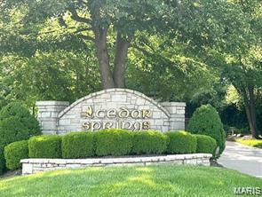 SHOWINGS START NOON 8/30/2026...Beautiful Cedar Springs is a hidden resort-style community near shopping and excellent schools.  Guard house entry, pool, tennis, pickleball, club house, lake, walking trail and convenient ground care and snow removal are offered. Three fireplaces, handsome laundry room with washer, dryer, refrigeratror, utility sink & opens to garage and exterior. Vaulted ceilings, tall windows, wood/carpet/tile flooring & gorgeous private grounds.