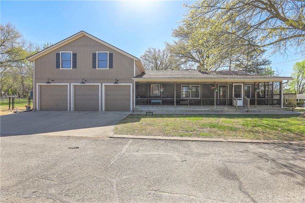 SELLERS SERIOUSLY WANT THIS SOLD NOW!!  HURRY - AND GET A STEAL OF A DEAL!!!!!  This beautiful story and a half is over 2,400 Square Feet! It has that open concept main floor with a gorgeous stone fireplace. There is a private martini deck off the master suite, and the fully screened front porch gives that lake house - on vacation vibe you'll get to experience every day of the year!  Plus, it has a 3 car garage and a huge, level fenced yard!!  Your private dock is just a short walk, less than 500 feet away!