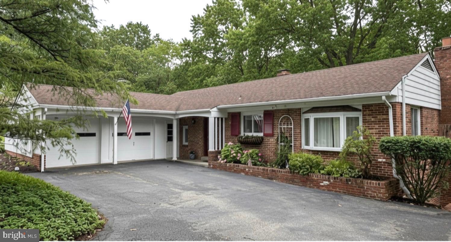 Welcome to 241 Orchard Road, a deceptively spacious Palmer built ranch style home, nestled in Paoli's beloved Valley Hills neighborhood. Built in 1958, this well-established home offers 4 bedrooms and 4 full bathrooms on a quiet, tree-lined street with a true sense of community. The kitchen with stainless steel appliances and an eat-in island is the first thing you will notice as you enter the home, and through it, the bright dining room. A few steps down, you have a large living room with an incredible view to the patio and trees beyond , with a sliding door offering easy access to incredible entertaining space or the perfect spot for your morning coffee! As you head to your left and follow the hardwood floors down the hall, you will discover three bedrooms and three full baths. This arrangement offers space and privacy to all who are lucky enough to live here. This home offers the best of one one level living, but with a bonus of almost 1000 sq. ft of walk out lower level space which includes an additional bedroom, bath and laundry room, as well as a great room with a fireplace!  This level also affords excellent storage space. A spacious two car garage adds even more function to this incredible home.Just minutes from the Paoli SEPTA Regional Rail station, Friendship Park, and the shops and restaurants along Route 30, the location delivers the perfect balance of suburban tranquility and everyday convenience — with seamless access to Philadelphia, King of Prussia, and beyond via U.S. Route 202 and the Pennsylvania Turnpike. Paoli itself is a destination.  The borough offers a rich blend of history, natural beauty, and community spirit- from the Paoli Battlefield and Valley Forge National Historical Park to Jenkins Arboretum & Gardens and a charming downtown of local shops and restaurants.