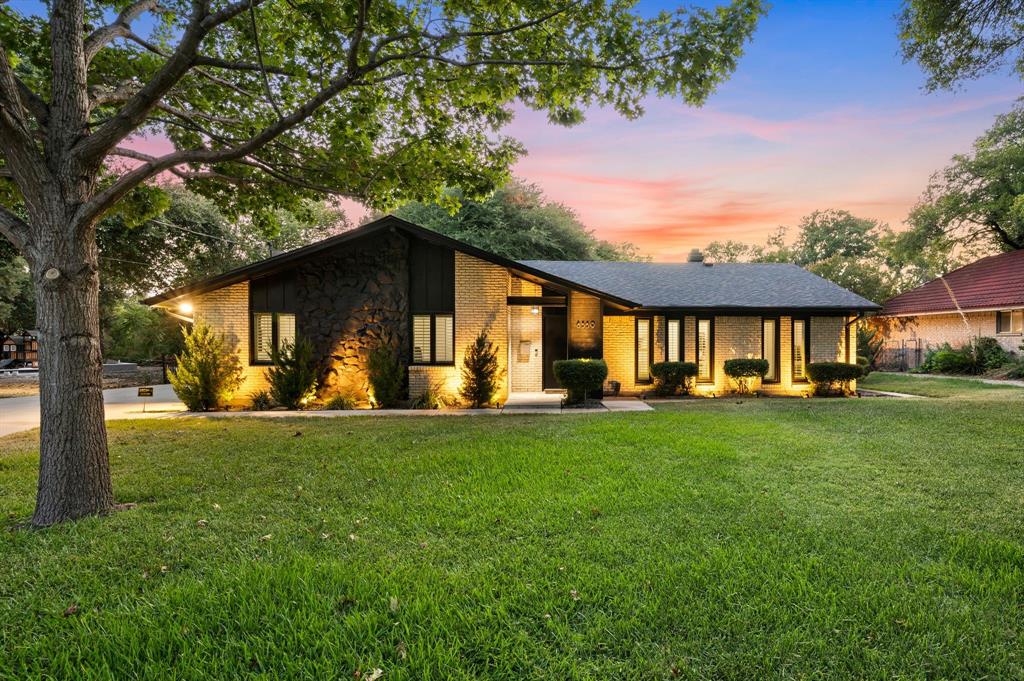 Tucked just off Mediterranean Drive, convienently off Northwest Highway, this ranch-style home sits on a beautiful, mature half-acre creek lot with serene views, privacy, and plenty of room to add a pool. *** All major systems were updated or replaced in 2023, including the HVAC, roof, plumbing, foundation, doors, windows, a new driveway and extensive landscaping.*** Inside, the spacious floor plan has two open living areas, four bedrooms, two full baths and one half bath, a walk-in laundry room, and an enclosed pantry. The kitchen and bathrooms have updated countertops. With major improvements already completed, this property offers a great combination of creek-side privacy, mature surroundings, and generous outdoor space.