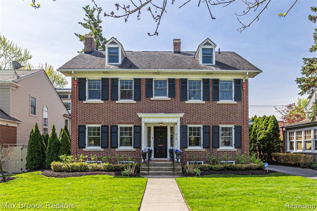 Stately 4 bedroom brick colonial in Poppleton Park with an easy walk into downtown Birmingham. White cabinets in the updated kitchen with new (2026) top of the line SS Thermador Ref, Gas Stove w/Pot Filler and Dishwasher, subway tile backsplash, quartz counters, pantry and an eat-in space (table can be removed). Large Living Room with hardwood floors and remote control gas fireplace. Formal Dining Room and a separate Sitting Room/Sun Room. Great mud space entry off the back with a heated floor. Second floor includes 3 bedrooms, an office/nursery, two renovated baths and a walk out balcony. Third floor is a wonderful primary bedroom suite with large walk-in closet, luxurious bath and sitting area. Finished basement has a rec room with fireplace, workout area, laundry (wash/dry - 2025), workshop and storage (plant room is prepped for a bath). Brick paver patio on a beautiful fenced lot that includes play structure area (included). Rare 3 car detached garage. Steam heat. Central Air - 2024. Replacement windows. Tons of character and charm. Two great parks nearby - recently renovated Adams Park and Poppleton Park which is currently being redone.