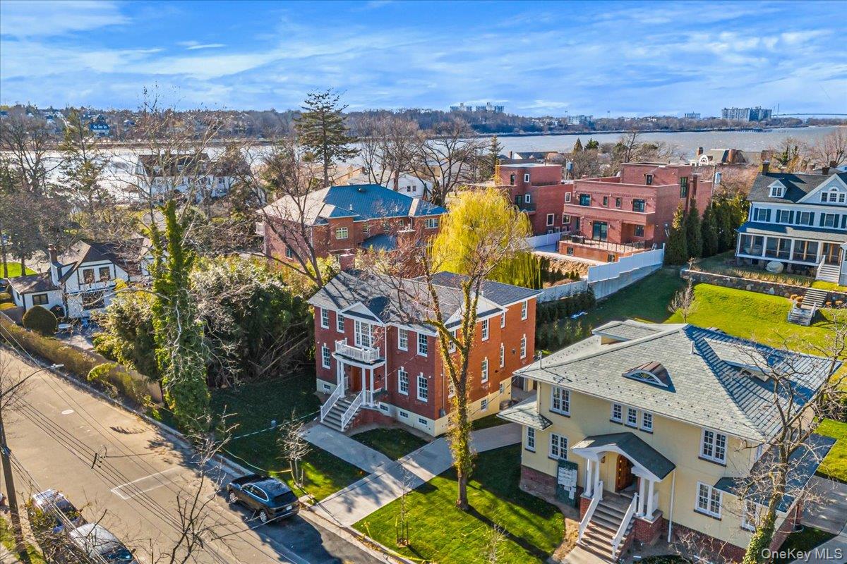 Enjoy the most beautiful Sunrises and the most Breathtaking Sunsets from this newly built Award-Winning 1 FamilyHome in the heart of Douglaston.  Set on a beautifully landscaped 6,725 sq ft lot.  This Stunning Home is EXCEPTIONALLY DESIGNED with vaulted ceilings at the entrance and a grand 20-ft foyer.   The expansive open-concept living area seamlessly connects to a gorgeous dining area adorned with an ELEGANT DESIGNED white MARBLE FIREPLACE that opens up to a chef’s built kitchen all with quartz countertops, custom cabinetry, appliances and a large pantry.  The house offers top amenities which include central air conditioning, 3 zone heating, central vac system, security cameras, and much more.   The home was built using top grade materials all with high end finishes.   Sliding doors lead to a spacious deck and GORGEOUSLY LANDSCAPED grounds. The street level basement provides so much more living space. for a Movie theater and game room (ping pong and pool tables) and much much more.  Conveniently located near the LIRR Douglaston station with easy access to Manhattan, downtown Flushing, shopping and dining.  Property is located in School District 26.