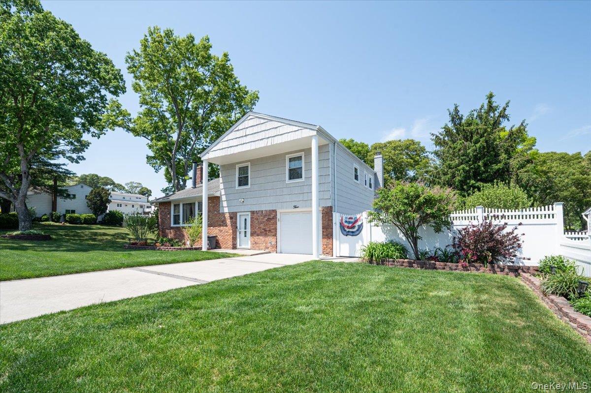 Welcome Home to this sprawling split nestled in the highly sought after town of Selden.  This 4 bed 3 bath home has been loved for decades and is ready for its new owners.   Soaring cathedral ceilings give this a larger than life feel inside.  Outside enjoy your private in ground pool, just in time for summer!! Minutes away from shopping, transportation and parks.  Welcome Home!!!