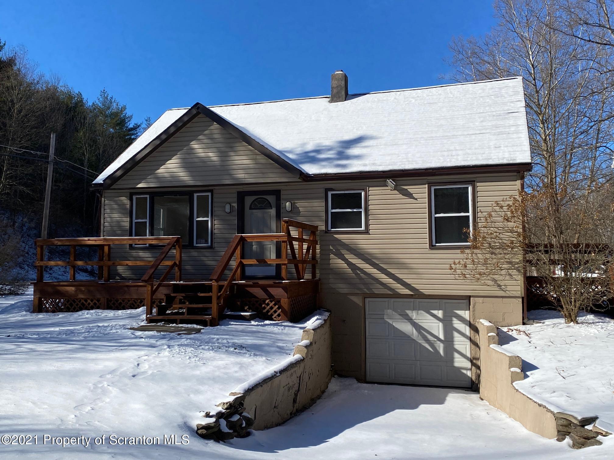 If you have the need for a remote office or have the opportunity to work from home, this cozy 2/3 bedroom, 1 bath home with garage is the perfect property for enjoying country living.  2nd floor could be a 3rd bedroom or an office.  Conveniently located 2 hrs from NYC, minutes to Clarks Summit, 1/2 hour to AVP International Airport. Easy access to ski resorts, golf courses and state parks. With private greenspace acreage and over 1/2 mile of stocked trout stream, you won't want to leave. Tenant is responsible for all utilities along with snow/lawn maintenance.  $43 fee per tenant for credit/background check.  Landlord prefers a two year lease.  Neighboring home will also be available in approximately 60 days if you'd like to live in one and run a business out of the other.  No smoking and no pets., Beds: 2+Bed1st, SqFt Fin - Main: 945.00, SqFt Fin - 3rd: 0.00, Baths: 1 Bath Lev 1, SqFt Fin - 2nd: 600.00, Comm Paid By: Landlord