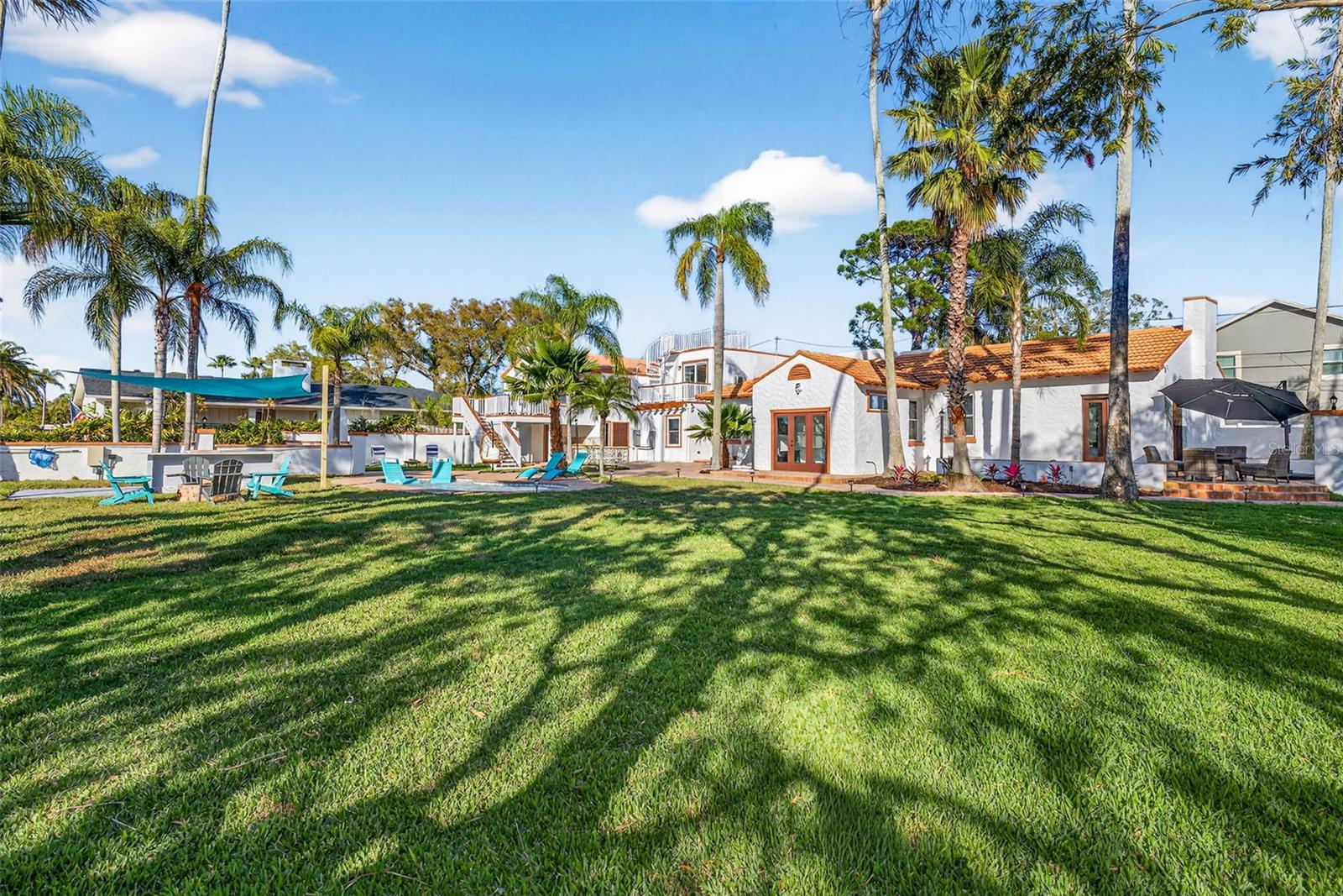 Welcome to 236 San Salvador Drive, a truly exceptional Spanish-style estate located in the highly sought after Dunedin Isles community. Experience captivating views overlooking St. Joseph Sound.  This fully remodeled property sits on an expansive 2¼ lots and offers a rare combination of luxury living, privacy, and outstanding income-producing potential.The stunning main residence features 4 bedrooms and 2 bathrooms, beautifully updated with high-end finishes throughout. The entire property has undergone an extensive renovation, including brand-new appliances, three new A/C units, and a newly constructed pool, creating a move-in-ready coastal retreat.Adding incredible versatility, the estate includes two separate private apartments, each with access to a dedicated laundry room, making them ideal for guest accommodations, multigenerational living, long-term rental income, or short-term vacation opportunities.Step outside to your own private oasis where a newly added pool and pool bath create the perfect setting for relaxing or entertaining. A charming brick-paved walkway winds through lush, mature landscaping, leading to multiple secluded sitting areas—perfect for enjoying Dunedin’s spectacular sunset views over the water.Privacy and curb appeal abound with a four-foot privacy wall surrounding the front and side of the property, while the oversized corner lot provides ample space for RV and boat parking—a rare find this close to the water.Whether you are seeking a luxury primary residence, a coastal compound, or an exceptional income-producing investment, this one-of-a-kind Dunedin Isles property offers endless possibilities in one of Florida’s most desirable waterfront communities.Buyer or Buyer's agent to confirm all leasing restrictions and rules with the City of DunedinRoom sizes are deemed reliable, but to be confirmed by Buyer(s).