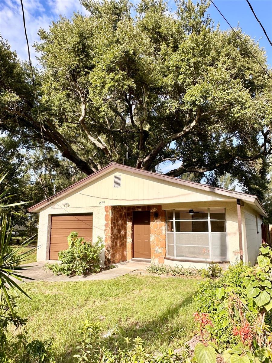 This 2-bedroom, 1-bathroom home features all-new luxury vinyl plank flooring throughout, spacious bedrooms, and an attached garage. The large kitchen comes equipped with new cabinets, new quartz countertops, and a wide bar that opens directly to the living room. Outside, you'll find a large backyard with plenty of usable space. Centrally located in Clearwater for quick commutes to St. Pete, Tampa, and local airports.