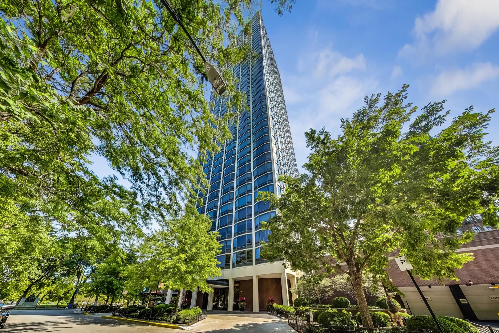 Exceptional - This is a wonderful unit in an outstanding building and location.  There are only 2 units on the floor, the common lobby has recently been remodeled.  Views of the lake from every room, as well as Lincoln Park to the north and the city to the south.   Main living and dining areas are expansive, with 2 seating areas.  Kitchen is open to a separate breakfast room.  Primary bedroom suite and dressing rooms can be opened to include the bonus room adjacent.  There are 2 additional bedrooms, one with recent updated ensuite bath and walk in shower.  Third full bath and a powder room add to the easy living.  In unit pantry and separate laundry room with stacked washer/dryer.  Building has an indoor pool, sun deck, exercise areas and tennis court.  Parking is easy with the valet for $200/month.  Amazing staff, no special assessments, 2 small pets allowed.