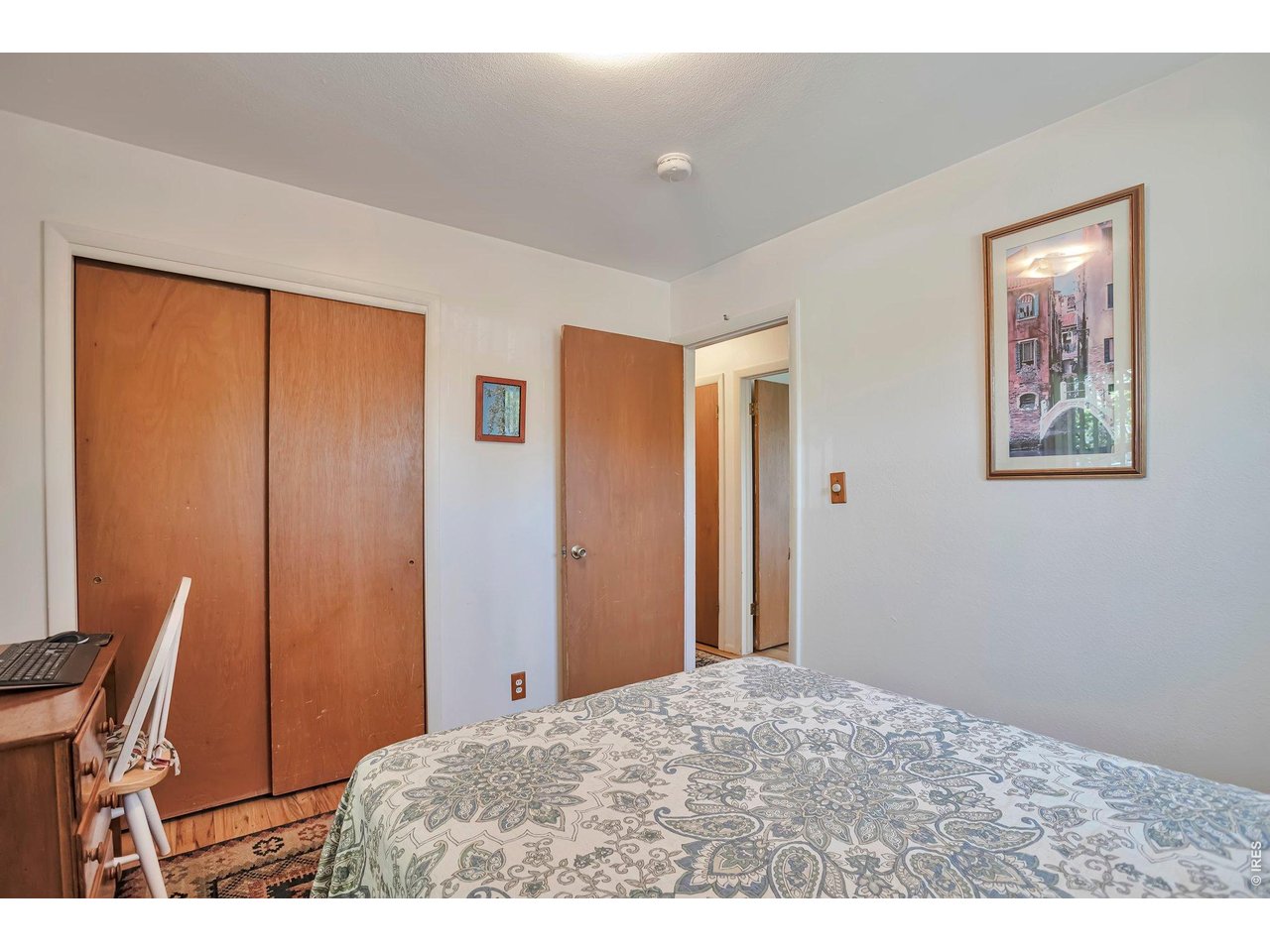 This recently upgraded ranch home is a private retreat with 6' & 7' FENCING & SECURE GATE. This centrally located ranch home has easy access to Hwy 36, CU, Pearl St. Mall, biking trails and RTD stops. CU students can hop on the Buff Bus just across the street and leave their car in the oversized garage. Improvements include newer roof, furnace, central air and windows. Master Bedroom with half bath and refinished hardwood floors in this bright, sunny home. Upgraded kitchen with 42-inch upper cabinets, new appliances, pantry, flooring, countertops/backsplash, KITCHENAID DISHWASHER, HIGH EFFICIENCY LG STACK WASHER/DRYER. Bath upgrades include new vanities, lighting and low flow toilets. Energy retrofits include ceiling insulation; a fully encapsulated crawlspace with a polypropylene envelope; HIGH EFFICIENCY CENTRAL AIR AND INTEGRATED CARRIER HEATING. New thermostat-controlled Attic Fan, NEW GPS IONIZING AIR PURIFIER - HIGH EFFICIENTY IONIZATION AIR FILTER THAT REMOVES SMOKE, ODORS, VIRUSES (LIKE COVID) AND REPLACES AIR EVERY 30 MINUTES. Exterior improvements feature oversized 1+ car garage, new garage door with Chamberlain Belt drive opener ( 2 remotes). New gutters with Leaf Filter shields system and new facia (north & south eaves). Completely sprinklered property with updated landscaping, front and back irrigation upgrades. New 8x10 shed with power, workbench, and shelving. New driveway with additional parking space (3 total spaces); new front, side and back sidewalks, and new front flagstone patio. Recreational Backyard with newer 4-person Wind River Spa hot tub. THE BACK PATIO IS COVERED BY A 50 YR. OLD CONCORD GRAPE ARBOR. Plum trees (front and back); Wild Raspberries in the backyard. Relax and enjoy the sunsets over the Flatirons while sipping on a glass of wine at Flatirons View Terrace in backyard. Property is currently leased until August 1, 2026 at $3,360 per month.