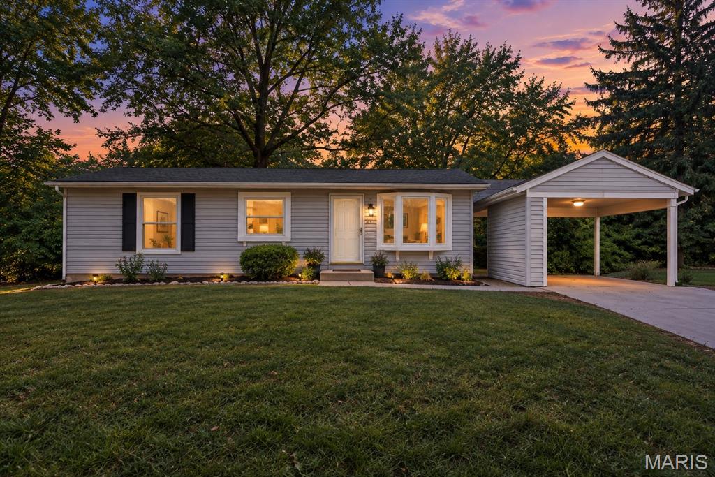 Charming 3 bedroom, 2 bath home on a great corner lot! The main level features LVP flooring throughout and a kitchen with new granite countertops. Laundry hookups are conveniently located on both the main floor and in the basement. The partially finished basement offers additional living space and includes a wood-burning fireplace—perfect for a family room, rec room, or entertaining space. Outside, enjoy the shaded backyard with a picnic bench and fire pit, making it a great spot to relax or gather with friends and family. The newly poured driveway offers plenty of parking with additional space for guests. A home with great space, updates, and plenty of room to enjoy both inside and out!