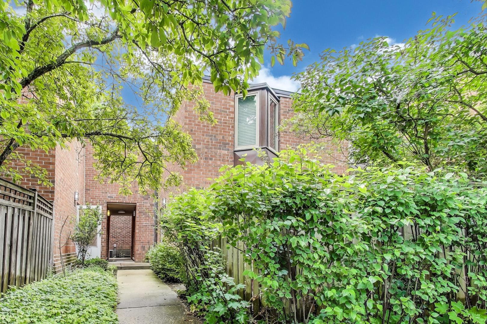 Welcome to this sun-filled 2-bedroom, 1-bathroom duplex nestled on a picturesque, tree-lined street just across from Oz Park. Located in the heart of Lincoln Park, this home offers the perfect blend of charm, comfort, and convenience. The main level features hardwood floors, a spacious living room, and an open-concept layout with an eat-in breakfast counter-plus plenty of space for a dining table. Step outside to your private outdoor patio oasis, ideal for summer entertaining or a quiet morning coffee. Upstairs, you'll find two bright bedrooms, a full bathroom, and in-unit washer and dryer. Large windows throughout the home flood every room with natural light. With its unbeatable location, classic character, and thoughtful layout, this home is a true Lincoln Park gem. Don't miss your chance to live in the center of parks, shops, dining, and more! 1 exterior parking space included in the price.