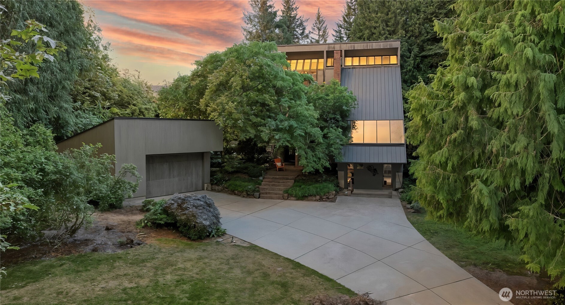 Custom home, built by Mercer Island Architect in NW “shed design” finally for sale! Nestled on large lot w/mature landscaping & green spaces for true PNW vibes. Cedar vaulted ceilings in living & primary that are stunning w/tons of natural light. Updated baths, chefs kitchen & numerous other high end features throughout. Homestead Hills is known for large estate homes w/no HOA, privacy, & friendly community feel. Convenient to shops, two trail systems, Kent & Private schools, major freeways, business hubs & SeaTac Airport - all while being tucked away in an rural like setting of unincorp. King County(no RTA). The home is surrounded by the outdoors ready for your next hobby equipped w/studio, pickle ball, 2 sheds, oversized garage & more!