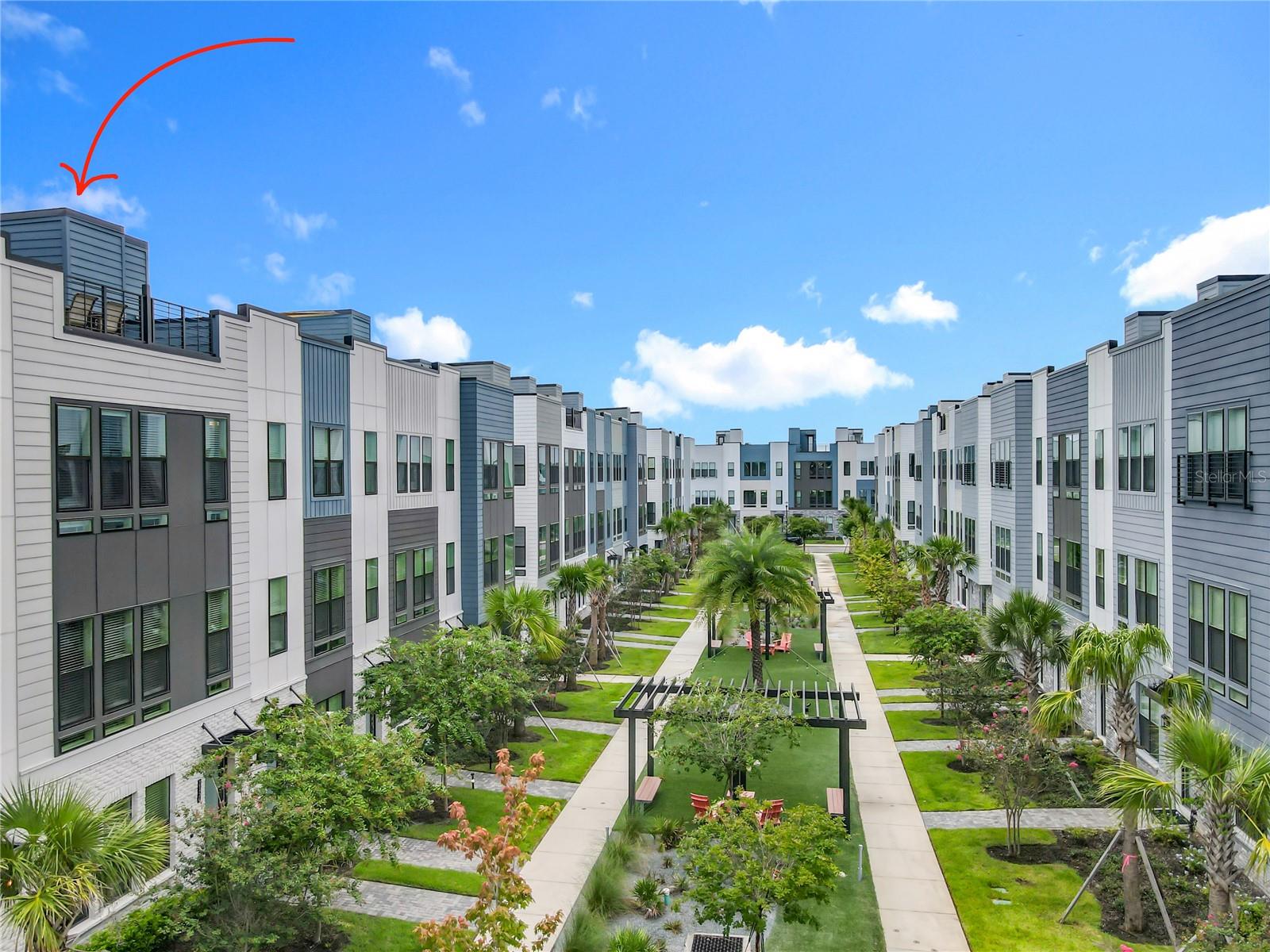 Rare Opportunity at The Brix at The Packing District! This exceptional 4-story luxury townhome offers 4 bedrooms, 3.5 bathrooms, a private rooftop terrace with panoramic views, a custom-built brick summer kitchen—perfect for entertaining. Available now and move-in ready.

Situated at the center of the community courtyard, this newly constructed residence showcases high-end finishes, including wood flooring throughout the bedrooms and stairs, iron rod stair railings, custom window blinds, and blackout curtains in the primary suite. 

The first floor includes a private room, closet, and full bathroom—ideal as a home office, yoga/fitness room, or in-law suite. 

The second floor features a gourmet kitchen with gas stove, stainless steel appliances,  cabinetry and pantry, family room with guest bathroom. 

On the third floor, you’ll find the spacious primary suite with a private en-suite bath, two additional bedrooms, a full secondary bath, and a conveniently located laundry room.

A two-car garage with additional storage space adds practicality to this luxury home. Two EV connectors inside, one on each side of the garage. Enjoy low-maintenance living with access to premium community amenities: a dog park, children’s play area, Foxtail Coffee, Great Southern Box Food Hall, 4Roots Farm, 1.5-mile walking and biking trail, green recreational areas, the amphitheater, the Orlando Tennis Centre, and the YMCA—all just steps away.

The home includes 78,000 in builder upgrades by Toll Brothers, plus an additional 29,000 in post-closing custom improvements by the owner—offering exceptional quality and value. 

Seller is offering up to 20,000 in buyer credit with a full-price offer, which may be applied toward closing costs, interest rate buy-down, down payment, or price reduction—as applicable and subject to buyer’s lender approval.

This is a rare opportunity to own a fully upgraded Citrine Modern II Model and save thousands—book your private showing today before it's gone!