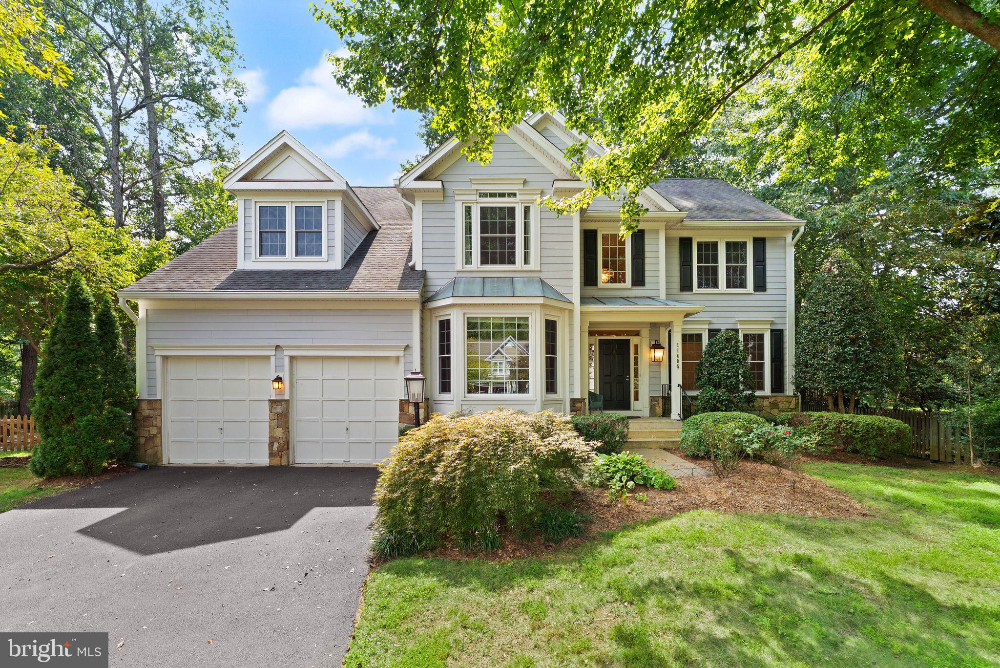 HUGE PRICE REDUCTION - 100K! Largest model in Reston's gorgeous Wescott Woods cluster.  IF You have visited this home before, you  need to COME BACK and see all the new UPDATES!! Brand NEW Kitchen with quartz, subway tile backsplash, stainless steel appliances, and island!! NEW PAINT and also NEW CARPET UPSTAIRS...It is MOVE IN READY and waiting FOR YOU!This totally updated home offers everything - close to commuter routes, Reston Town Center (great shopping and restaurants), Reston Metro, lakes, walking paths and more! From the dramtic two-story entry to the open and bright two-story family room, you will love the gorgeous newly finished hardwood floors and huge picture windows throughout.  The spacious living room/dining room (with extra bay window) combo is great for holiday dinners and entertaining. The gourmet kitchen has an island, granite, stainless steel and newly faced cabinets. The main level also has a large office/study with gorgeous cherry built-ins and bay window , but perhaps the best room is the four season sun room with custom built-ins located off the family room.  Nature views, walls of windows and skylights make this space peaceful and bright.The upper level includes a laundry room, 3 large secondary bedrooms with new carpet and a large primary suite with double windows, vaulted ceilings, customized walk-in closet and fully updated, gorgeous en suite bathroom.  Unlike so many Reston homes, this home has a WALK OUT/UP, fully finished basement that includes a wet bar, great media/rec space and a bonus room that can serve many purposes including office, gym, play area, guest room, etc. There is also a full bath, lots of storage space/rooms and engineered hardwood floors.Not to be out done by the interior features, don't miss all the updates and awesome exterior features which include: cul-de-sac location, hardiplank type siding (2012), wrapped new windows, (2012), roof and covered/capped gutters (2012), trex deck and steel railings (2021), fenced-in back yard with mature trees and small covered slate front porch. Welcome HOME!!!