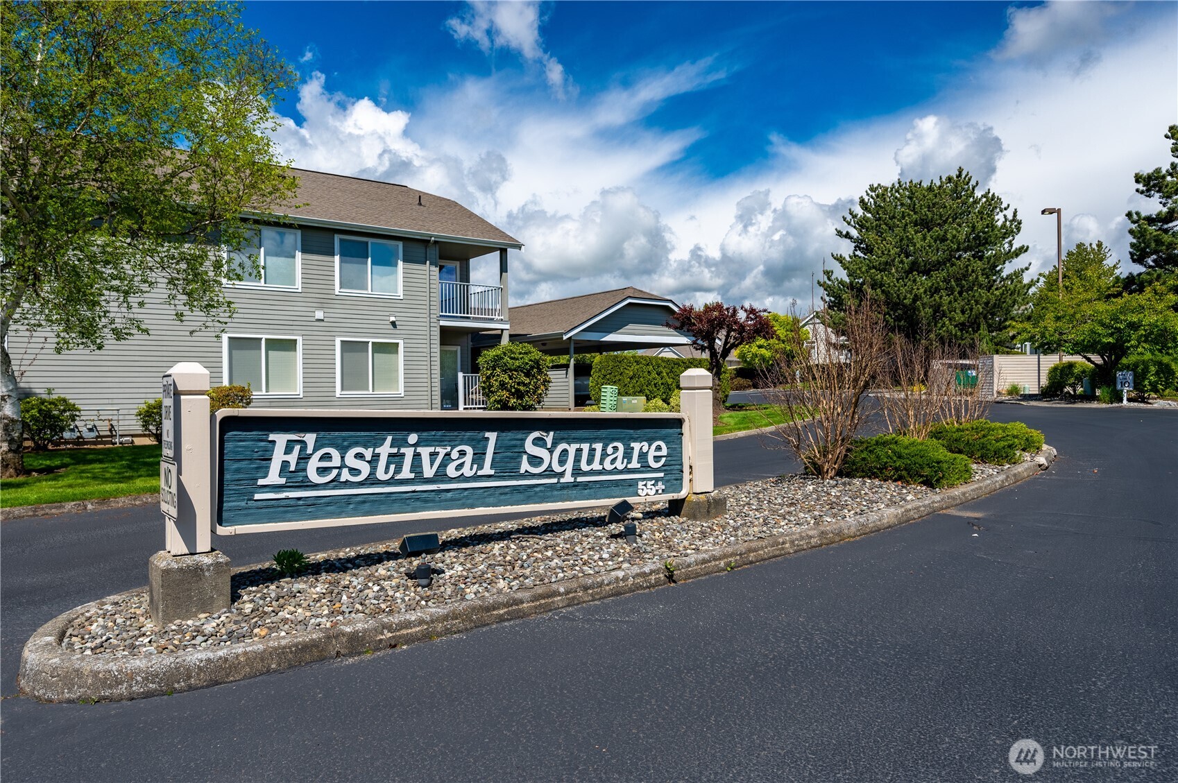 Welcome to this beautifully maintained, rarely used second-floor Festival Square condominium—an exceptional opportunity in a highly desirable 55+ community! With its two large bedrooms and impressive vaulted ceilings and abundant natural light from expansive south-facing windows, this spacious unit offers an inviting, open atmosphere. Step out onto the large deck and take in stunning views of Mount Baker, the Twin Sisters, and peaceful pastures adjacent to the Community College—a perfect place for relaxing or entertaining guests. Enjoy the benefits of a vibrant community featuring a clubhouse, convenient access to shopping, pickleball courts, medical offices, and a wealth of amenities catering to an active lifestyle. The original owners have used this condo as a second home, so it truly feels fresh and move-in ready. The financially stable HOA ensures peace of mind, with monthly dues covering water, sewer, garbage, basic cable, common area upkeep, and snow removal. Don’t miss your chance to enjoy low-maintenance living in a welcoming neighborhood. Schedule your private tour today and discover the comfort, convenience, and breathtaking vistas this Festival Square condo has to offer!