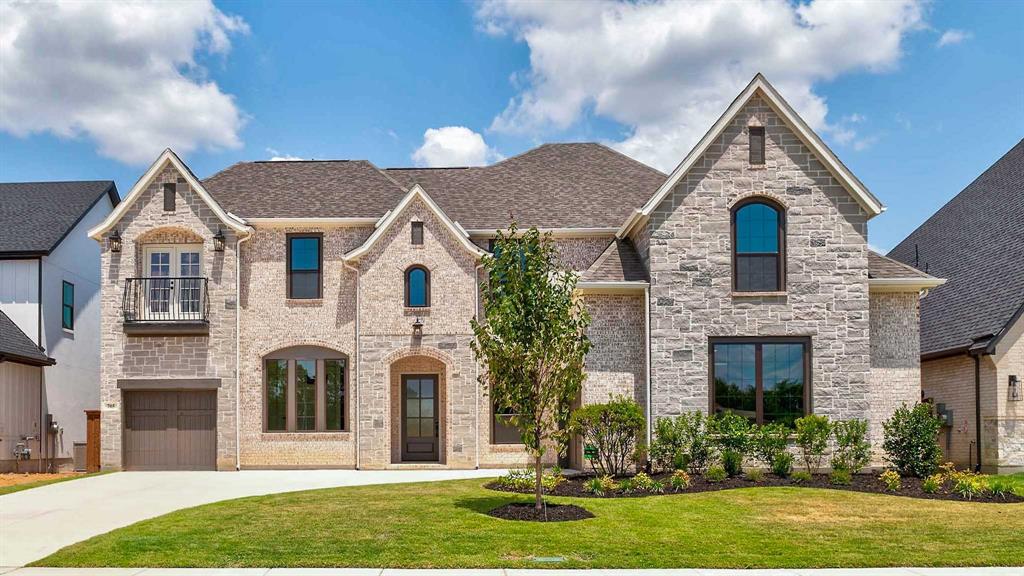 Two-story entry. Home office with French doors. Formal dining room. Family room features a cast stone fireplace, decorative beamed ceiling and a sliding glass door. Kitchen has an island with built-in seating space and a large walk-in pantry. Guest suite located on the first floor. Private primary suite features a wall of windows. Primary bath with dual vanities, freestanding tub, separate glass-enclosed shower and two walk-in closets. Secondary bedrooms, media room and game room complete the second floor. Extended covered backyard patio. Three-car split garage.