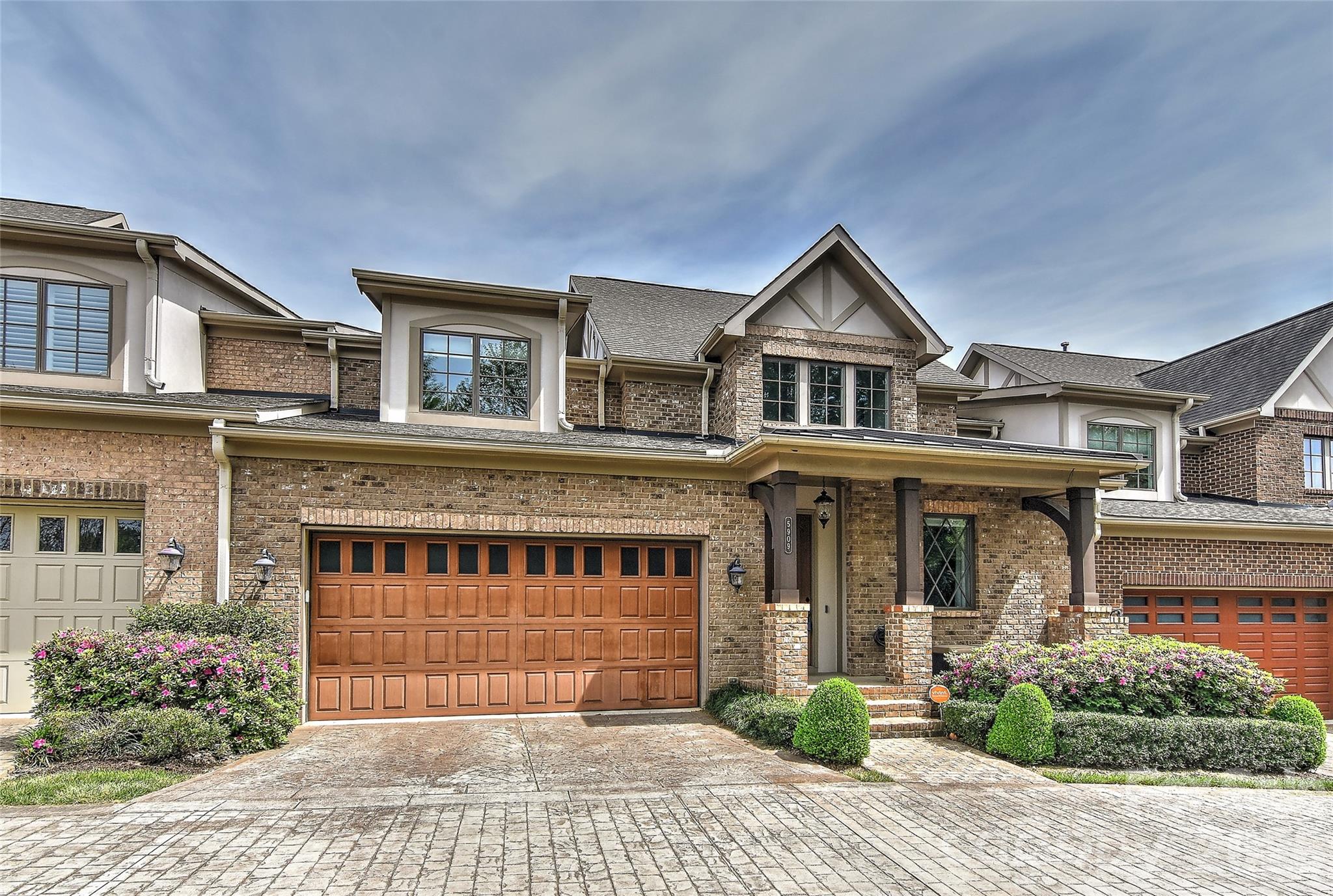 Move-in ready full brick and stucco townhome in phenomenal South Charlotte (Southpark area) location. Home features over 3000 sqft of living space with 10ft. ceilings on the main level and 9ft ceilings on the second level. Open and spacious floorplan with the primary bedroom suite and large custom walk-in closet on the main level. Kitchen features large island, stainless steel appliances with 48" Thermador Gas Range, Built-in Refrigerator, Custom Cabinetry, Backsplash and vent hood. Upstairs includes 2 secondary bedrooms with full baths and large loft with enough space for second floor bonus room and additional office space. Site finished hardwood floors throughout the main level and second floor landing, loft and hallways. Covered rear porch has been enclosed to create sunroom with heating source plus enclosed rear courtyard perfect for grilling, gardening or leisure. Perfect for those looking for low maintenance lifestyle and the convenience of all that South Charlotte has to offer.