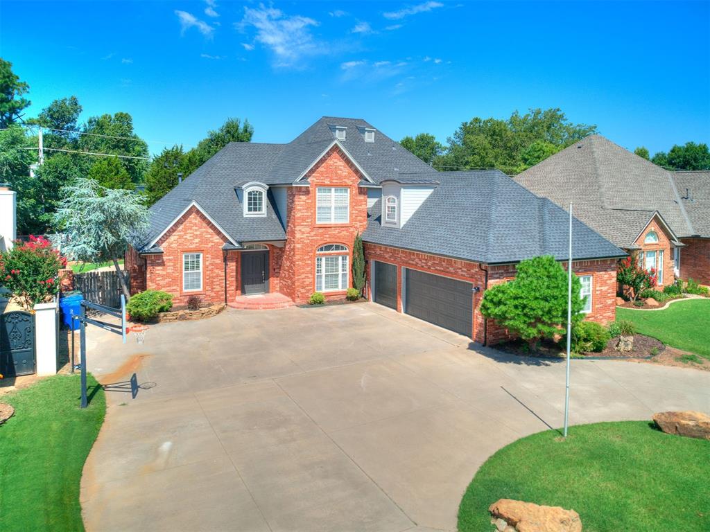 Welcome to this stunning residence in the highly sought-after Brookhaven community of West Norman. This beautifully updated home features 4 spacious bedrooms, 3 full bathrooms, 1 half bath, and a layout designed with both elegance and functionality in mind. From the moment you enter, you're greeted by a show-stopping chandelier that sets the tone for the quality and character found throughout the home. Just off the entry, the color-drenched study with custom built-in shelves provides a rich, private space for work or reading and a formal dining area with modern chandelier is ideal for entertaining. The heart of the home is the gourmet kitchen, which showcases a built-in refrigerator, gas cooktop, double wall ovens, and a blend of leathered granite and quartz countertops. A real marble backsplash, matte gold hardware, and custom cabinetry complete this truly designer space. Just off the kitchen, is a butler’s pantry with wet bar, wine glass storage and a new beverage fridge. The main living room features brand new real hardwood flooring and a stunning marble floral tile fireplace, creating a sophisticated yet inviting gathering area. The downstairs primary suite is a luxurious retreat with his and her vanities, a safe room hidden within the walk-in closet, and serene design details. Upstairs, you'll find three additional bedrooms, two full bathrooms, and a bonus area, perfect for a media room, playroom, or home theater setup. Additional updates include new paint throughout, new carpet, new exterior paint, a new garage door, and a new garage door opener.