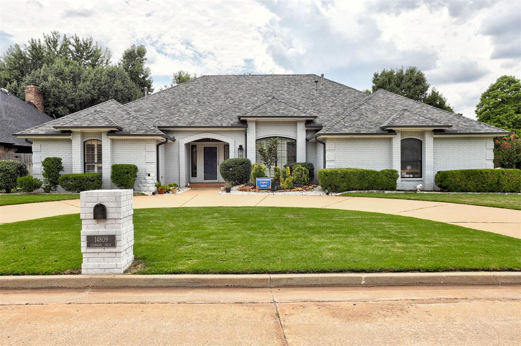 Situated on a prime corner lot in the sought-after Glen Eagles Estates, this 3 bed, 2.5 bath, 2,950 sq ft home offers comfort, style, and peace of mind. Inside, enjoy two inviting living areas, a formal dining room, a custom designed office space, and two fireplaces for cozy Oklahoma evenings. Thoughtfully refreshed, it boasts a Class 3 Malarkey roof (Dec 2023), new HVAC (2024), new garage door with Wi-Fi opener, and R-30 attic insulation (Feb 2025) for exceptional energy efficiency and long-term durability. The kitchen and bar areas are also updated, blending timeless Quartz counters and Moen faucets with tasteful modern touches. All three bedrooms are generously sized, including a primary suite with a spa-like bath and walk-in closets. Step outside to a covered patio overlooking a manicured backyard, perfect for entertaining or relaxing. Minutes from Costco, Chisholm Creek’s dining and entertainment, and top-rated Edmond schools, this move-in ready home truly checks all the boxes.
