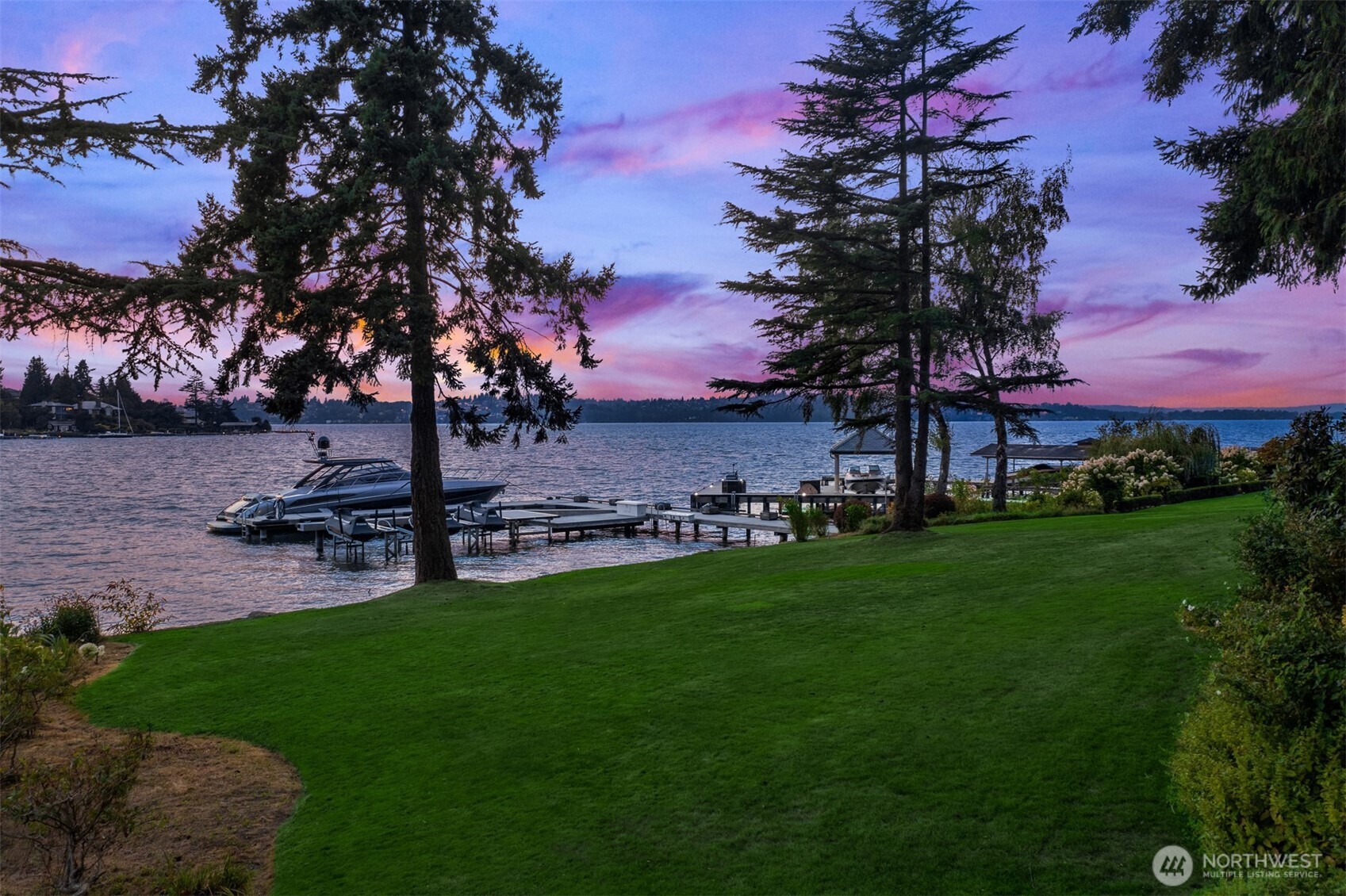 Discover the ultimate expression of luxury and prestige on Hunts Point’s desirable shores. This rare, nearly 2-acre west-facing estate boasts 139 feet of Lake Washington waterfront, offering either a canvas for reimagining the existing home or a sublime setting for your dream estate. Complementing the property is a newly expanded, state-of-the-art dock designed to accommodate the most discerning yacht enthusiasts. This unparalleled property merges location, possibility, and lifestyle - don't miss this scarce opportunity to own and shape a piece of the Pacific Northwest's most desirable real estate.