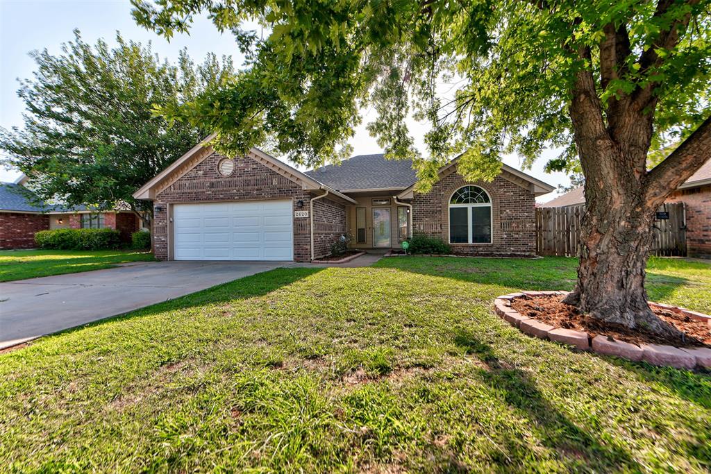 Welcome to this 3-bedroom, 2-bath home featuring a spacious layout and numerous updates! Step inside to find new laminate flooring throughout the main living areas, creating a warm and inviting space that's perfect for everyday living and entertaining. The large living room, with a cozy gas fireplace, flows seamlessly into the dining area, where a charming walk-in bay offers additional seating and beautiful views of the expansive, fully fenced backyard.Enjoy outdoor living on the backyard patio, with a mostly new privacy fence providing plenty of space for pets, play, or gatherings. The kitchen has been updated with a new garbage disposal, and a new oven/stove to be purchased prior to closing. Additional recent improvements include a new roof (2021) and a new garage door for added peace of mind.The private primary suite is a true retreat, featuring two walk-in closets and an en-suite bath complete with a relaxing jetted soaker tub and a separate walk-in shower. A spacious 2-car garage and thoughtful updates throughout make this home move-in ready. Don't miss your opportunity to make this beautiful property your next home!