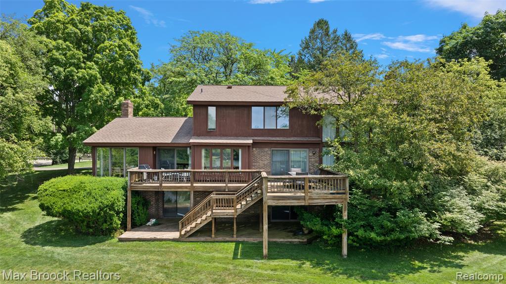Take this opportunity to live in one of Bloomfield Township's finest lakefront communities. Lower Long Lake is coveted for its nature and serene setting. Recently converted to an all-sports lake, with no wake, you can now connect to Upper Long Lake and Forest Lake, making it a rare tributary in Oakland County. This is a perfect opportunity to renovate or build your dream home on this spectacular property. Bloomfield Hills Schools complete the package.