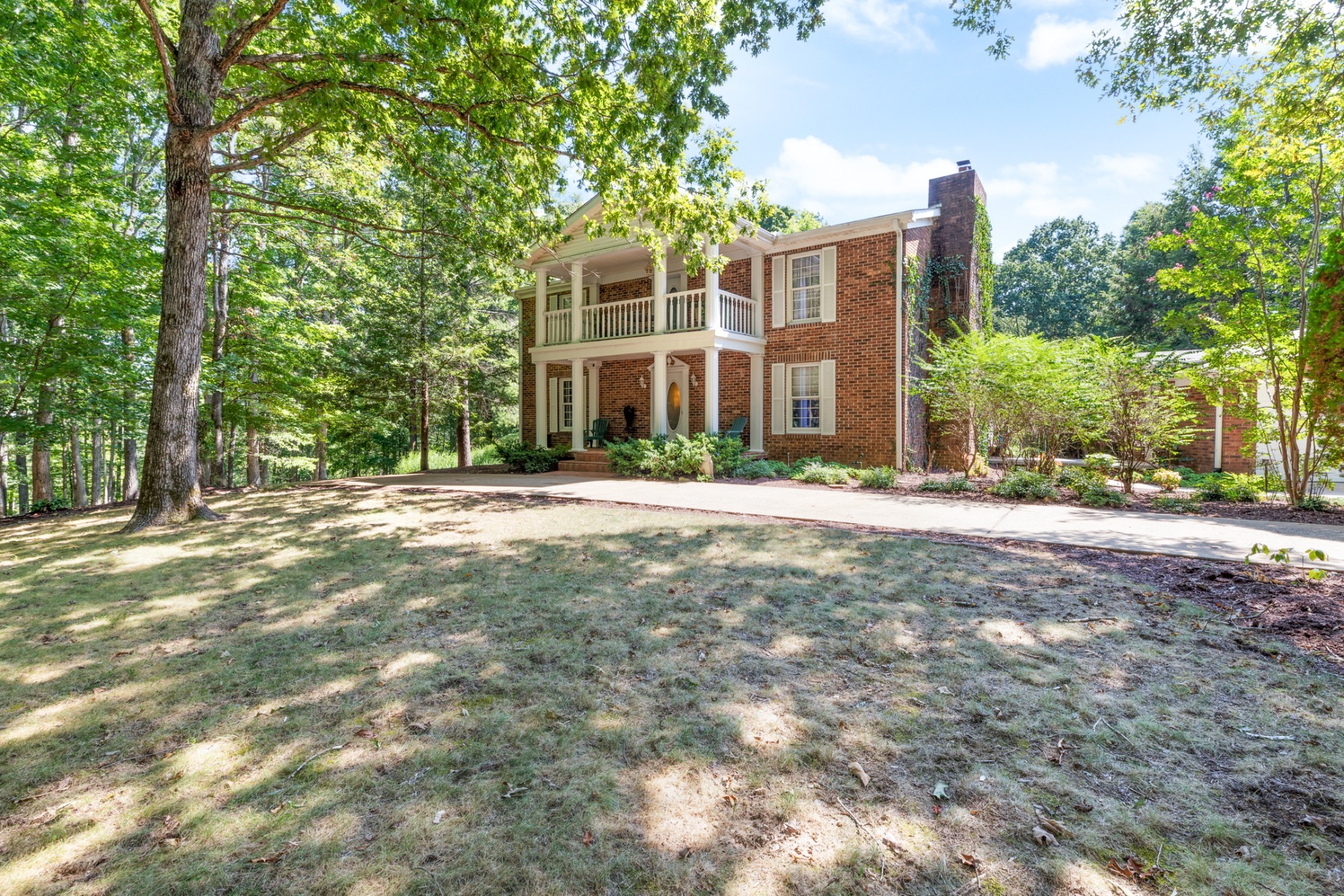 Private 104-acre Tennessee retreat offering the perfect blend of recreation, farming, and peaceful country living! Rolling hills, mature timber, open pasture, a stocked pond, abundant deer and turkey, and an impressive 16x16 elevated hunting cabin make this property truly one of a kind. A picturesque entrance and long concrete drive lead to a timeless home tucked away in complete privacy. Inside you'll find hardwood floors, fresh paint, a grand staircase, 3 fireplaces, custom built-ins, granite countertops, newer appliances, and a formal dining room with fireplace. Relax on the spacious covered porches overlooking this beautiful property. New roof in 2025! Additional features include a detached 2-car garage, whole-house generator, Apollo 100-gallon water tank, MLConnect Fiber Internet, and a partially finished basement with workshop, gun room, hobby room, full bath, and abundant storage. Whether you're looking for a forever home, hunting retreat, working farm, or legacy property, this rare offering is full of opportunity. The acreage is approximate, could be 5 - 10+ acres. This property is also listed with an additional 94 acres -  See MLS#3319282
