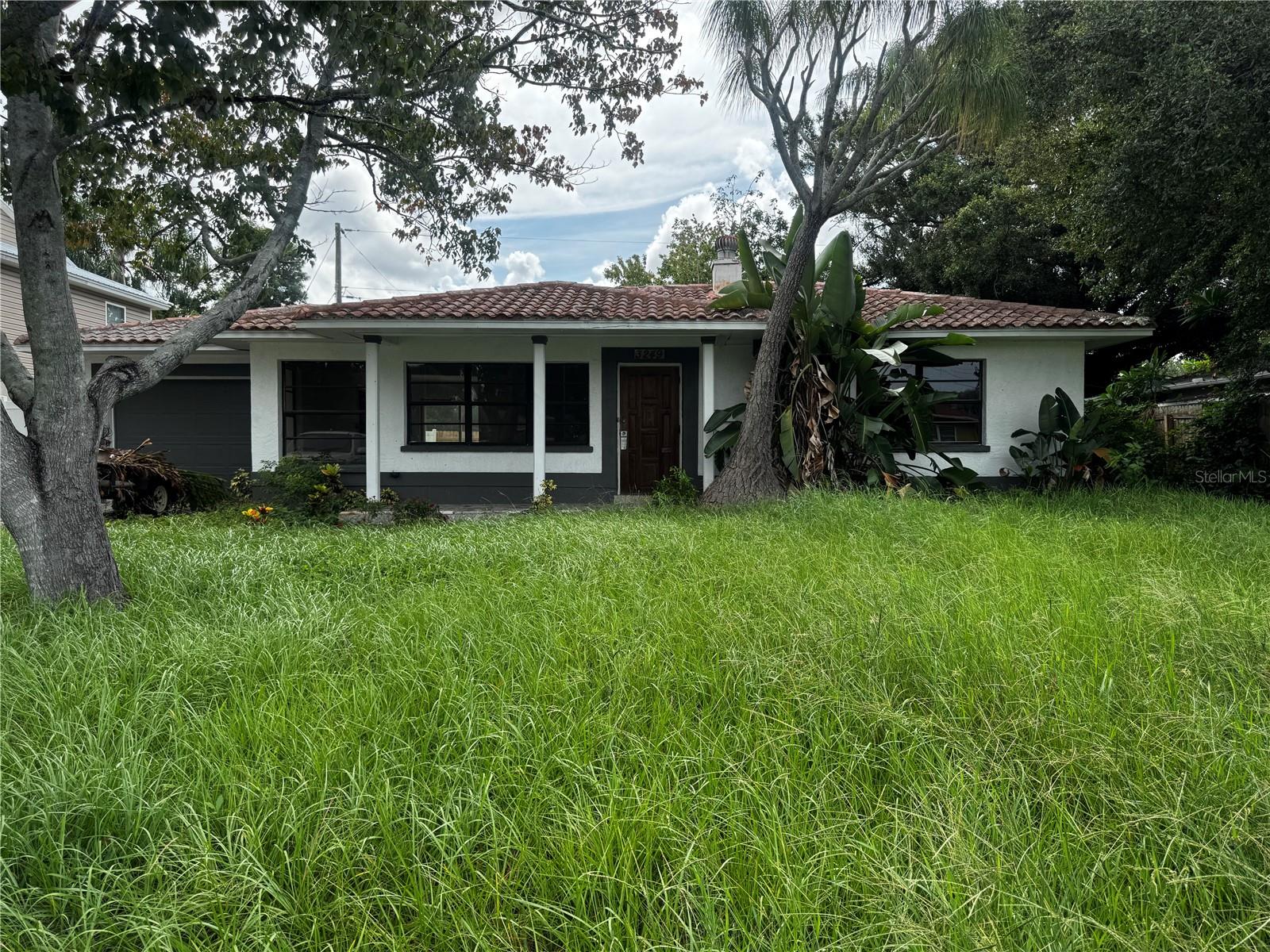 Calling all INVESTORS !  This is an excellent opportunity to bring your vision to life in St. Petersburg. This 3-bedroom, 2-bath home offers a functional layout, spacious living areas, a pool, attached garage, and a generous backyard. The property has already received some updates, including luxury vinyl plank flooring, refreshed kitchen cabinetry, and updated bathroom finishes, while still offering plenty of room for additional improvements and value-add potential. Whether you’re looking for your next renovation project, investment property, or primary residence with equity potential, this property is worth a look. Conveniently located near shopping, dining, parks, and major roadways. Don’t miss this opportunity!