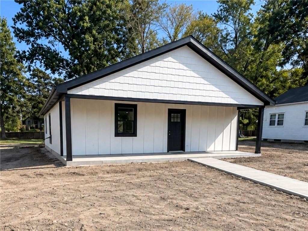 Brand-new construction in Butler designed with efficiency, comfort, and long-term durability in mind! This thoughtfully designed home offers easy main-level living paired with clean, modern finishes and practical features throughout.Built using Insulated Concrete Form (ICF) construction, the home is designed with energy efficiency and durability at the forefront. An energy-efficient mini-split heating and cooling system provides comfortable climate control while complementing the home’s efficient design.The exterior features classic board-and-batten siding accented by a shingle roof for a clean, modern look. A concrete walkway leads to the private entrance, while the inviting covered front porch provides a sheltered outdoor space to welcome guests or enjoy a quiet moment outside.Inside, the new construction provides a fresh, move-in-ready space and a neutral backdrop ready for the next owner to make their own. The convenient main-level layout keeps everyday living simple and functional, with modern finishes completing the home.Located near the heart of Butler in an established neighborhood setting, this newly built home brings together modern construction, energy-conscious features, low-maintenance living, and convenient access to the surrounding community. A great opportunity to own a brand-new home built with efficiency and longevity in mind!
