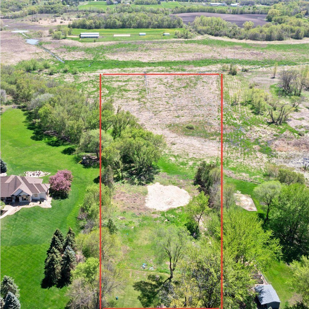 Discover the perfect setting for your dream home on this gorgeous nearly 4-acre lot, able to provide a walk-out basement. This spacious open land offers picturesque views and mature trees, creating a serene and beautiful environment. The exclusive easement for the driveway is conveniently located to the west of the property. Situated within the highly regarded Orono School District, this land provides an exceptional opportunity to build your ideal residence in a sought-after community.