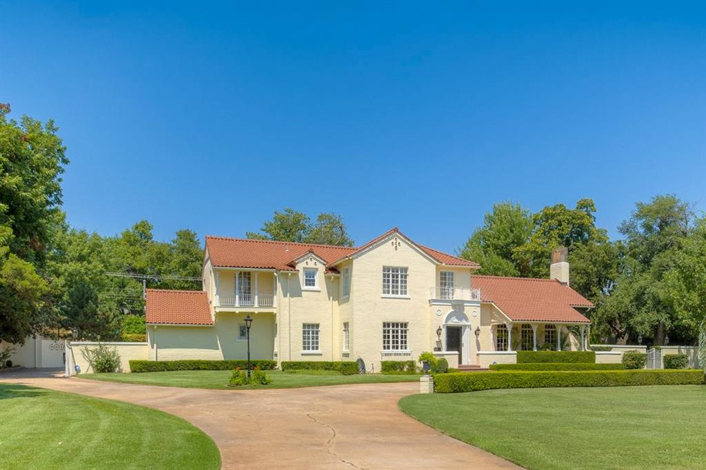 This stunning Spanish Colonial Revival home in Nichols Hills, Oklahoma City, offers a blend of classic architectural charm and modern luxury amenities. This home sits on a large lot with mature trees and established landscaping, providing a lush and private setting. The backyard is a secluded haven featuring a beautiful cabana, a unique piano-shaped swimming pool, and a vine-covered arbor, ideal for relaxation and entertaining. Convenient access to upscale shopping at Classen Curve and Nichols Hills Plaza, with luxury retailers and fine dining.

Owner/Broker. 24-hour notice is required.  Showing times 1pm to 5pm