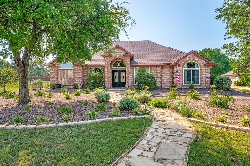 Nestled on just over an acre in the highly sought after Preston Hills community, this beautifully updated 1.5 story Texas traditional ranch offers the perfect blend of space, privacy, and modern comfort with no HOA.This exceptional home features 4 bedrooms, 3 full bathrooms, a dedicated office, and a versatile bonus room that can serve as a fourth bedroom, game room, or media room. The open floor plan is designed for both comfortable everyday living and effortless entertaining.The heart of the home is the upgraded kitchen, complete with granite countertops, tile backsplash, upgraded appliances, and elegant oil rubbed bronze hardware and fixtures. Throughout the home, you will find upgraded lighting, rocker light switches, luxury vinyl plank flooring, and new carpet in the bedrooms.Built with quality and efficiency in mind, this home includes spray foam insulation in the attic, Renewal by Andersen windows, a striking steel double front door, and a Class 4 impact resistant roof installed in 2023. Oversized 6 inch gutters and downspouts provide added durability and peace of mind.The spacious primary suite is a true retreat, featuring a beautifully renovated bathroom with a jetted soaking tub and an oversized walk in shower.Step outside to your own private backyard oasis. The renovated outdoor living space includes all furniture, rugs, chaise lounges, umbrella, deck boxes, custom BBQ grill, outdoor television, and retractable shade, creating a turnkey entertaining space ready to enjoy from day one. A thriving garden and expansive grounds offer endless opportunities to relax, entertain, and enjoy the peaceful setting.Car enthusiasts and hobbyists will appreciate the rare 4 car garage, providing abundant storage and workspace.With timeless Texas ranch architecture, extensive upgrades, no HOA, and a premier location in Preston Hills, this remarkable property offers refined country living with the convenience of nearby shopping, dining, and top rated schools.