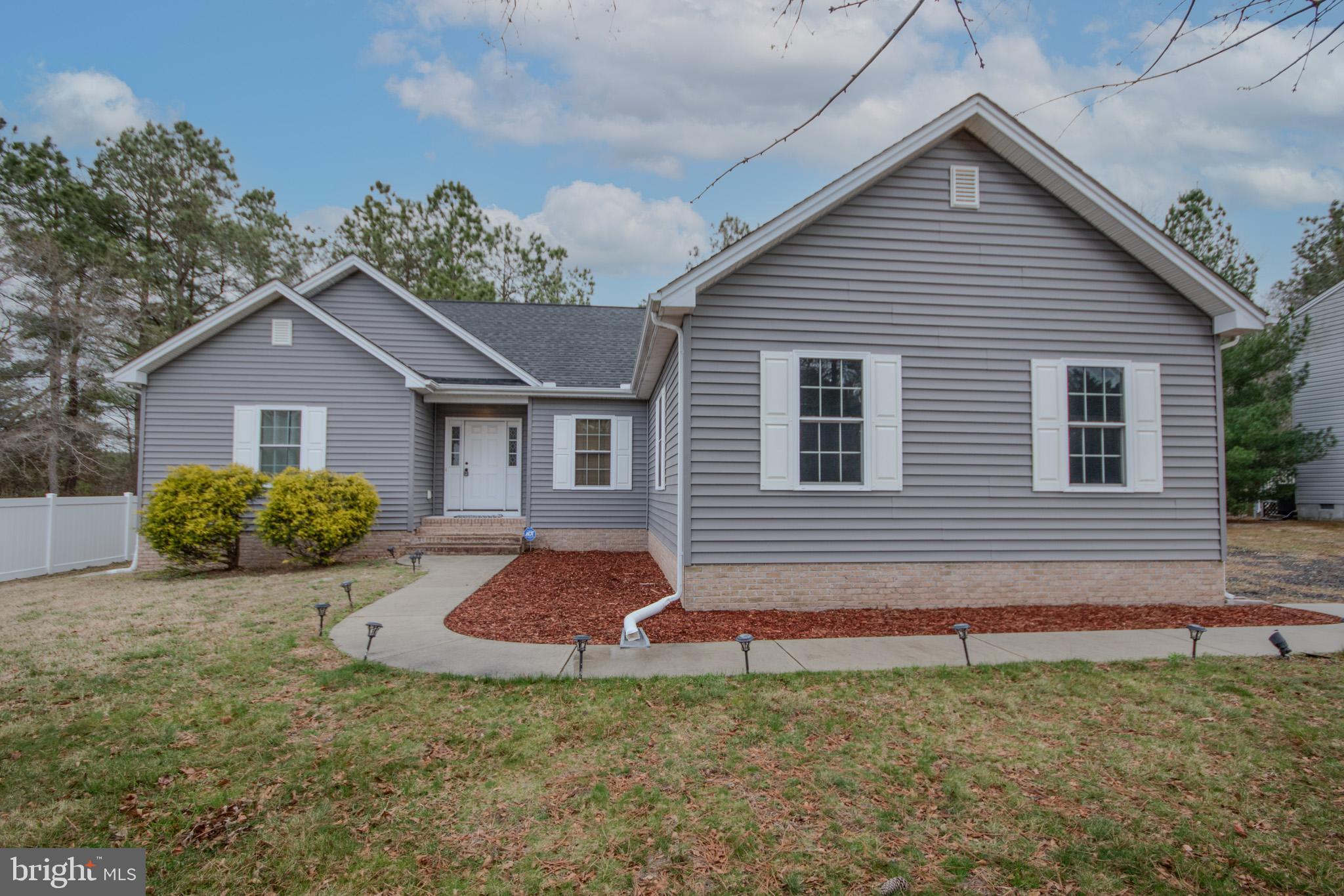 Welcome to 5987 Deer Creek Drive, located in the desirable Deer Creek subdivision in Pittsville. This well-maintained home offers 3 bedrooms and 2 full bathrooms across 1,707 square feet of comfortable living space, all situated on a spacious 0.58-acre lot. Step inside to an inviting open floor plan that seamlessly connects the living, dining, and kitchen areas that's perfect for everyday living and entertaining. Enjoy outdoor relaxation on the rear deck overlooking a partially fenced backyard, ideal for pets, play, or gatherings. Additional highlights include an attached 2-car garage, generous yard space, and a peaceful neighborhood setting while still being conveniently located to nearby amenities. Don’t miss the opportunity to make this charming Deer Creek home your own! Schedule your private showing today.