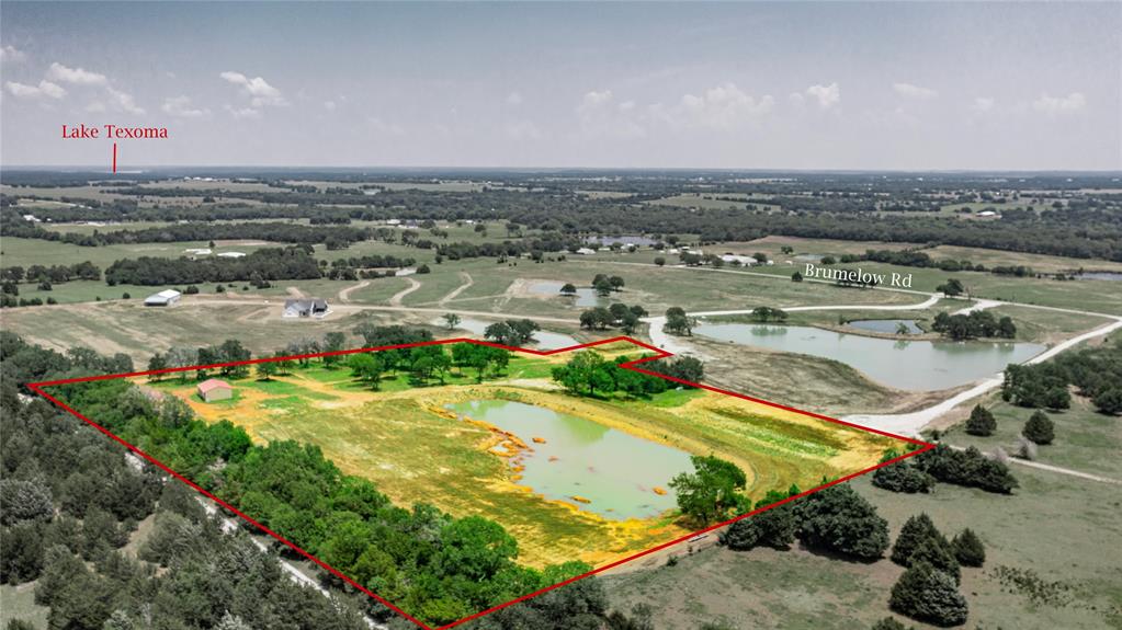 Welcome to breathtaking 1771 Brumelow Road in Whitesboro, Texas—a rare opportunity to own an exceptional 12.206 acre, AG-exempt property offering stunning panoramic views from its elevated homesite. Surrounded by the beauty of North Texas countryside, this remarkable property combines privacy, functionality, and endless potential.The land is highlighted by a large scenic pond, a productive 200-foot-deep water well delivering approximately 17 gallons per minute, and an impressive 30' x 40' spray foam insulated shop with electricity already in place. The shop has been thoughtfully designed with rough-in plumbing for a future kitchen, bathroom, and loft, making it ideal for a guest quarters, barndominium conversion, workshop, or recreational retreat.Conveniently located just minutes from Lake Texoma and the charming town of Whitesboro, this property offers the perfect balance of peaceful country living and easy access to dining, shopping, recreation, and major amenities.Properties of this caliber are seldom available. Whether you're seeking a private estate, weekend getaway, recreational property, or future homesite, this is truly one of the most beautiful tracts you'll find. Recent survey available. Don't miss your chance to own this extraordinary piece of Texas countryside.