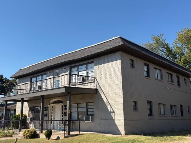 PRIME INVESTMENT: 8-Unit Boutique Apartment Building in OKC's Cultural Hub. Exceptional investment opportunity in a rapidly developing area between the Asian District and Paseo Arts District. This well-maintained property features eight studio apartments, ideally suited for workforce housing in Oklahoma City's growing rental market. The property boasts a new roof installed in 2023 and maintains an impressive 12-year history with no insurance claims. This smoke-free and pet-free building includes secure off-street parking through a rear alley and an on-site laundry facility for tenant convenience. Each studio apartment features classic hardwood floors in most units, decorative fireplaces adding character, full kitchens, and spacious walk-in closets. The prime location offers quick access to major employers, with St. Anthony's Hospital, OU Health Sciences Center, and the State Capitol just minutes away. The property sits within walking distance to restaurants and shops, while Bricktown and downtown entertainment are easily accessible. The area is targeted for city improvements, ensuring strong workforce rental demand. This turnkey operation presents an attractive investment opportunity and is  an ideal entry into Oklahoma City's thriving multi-family market.