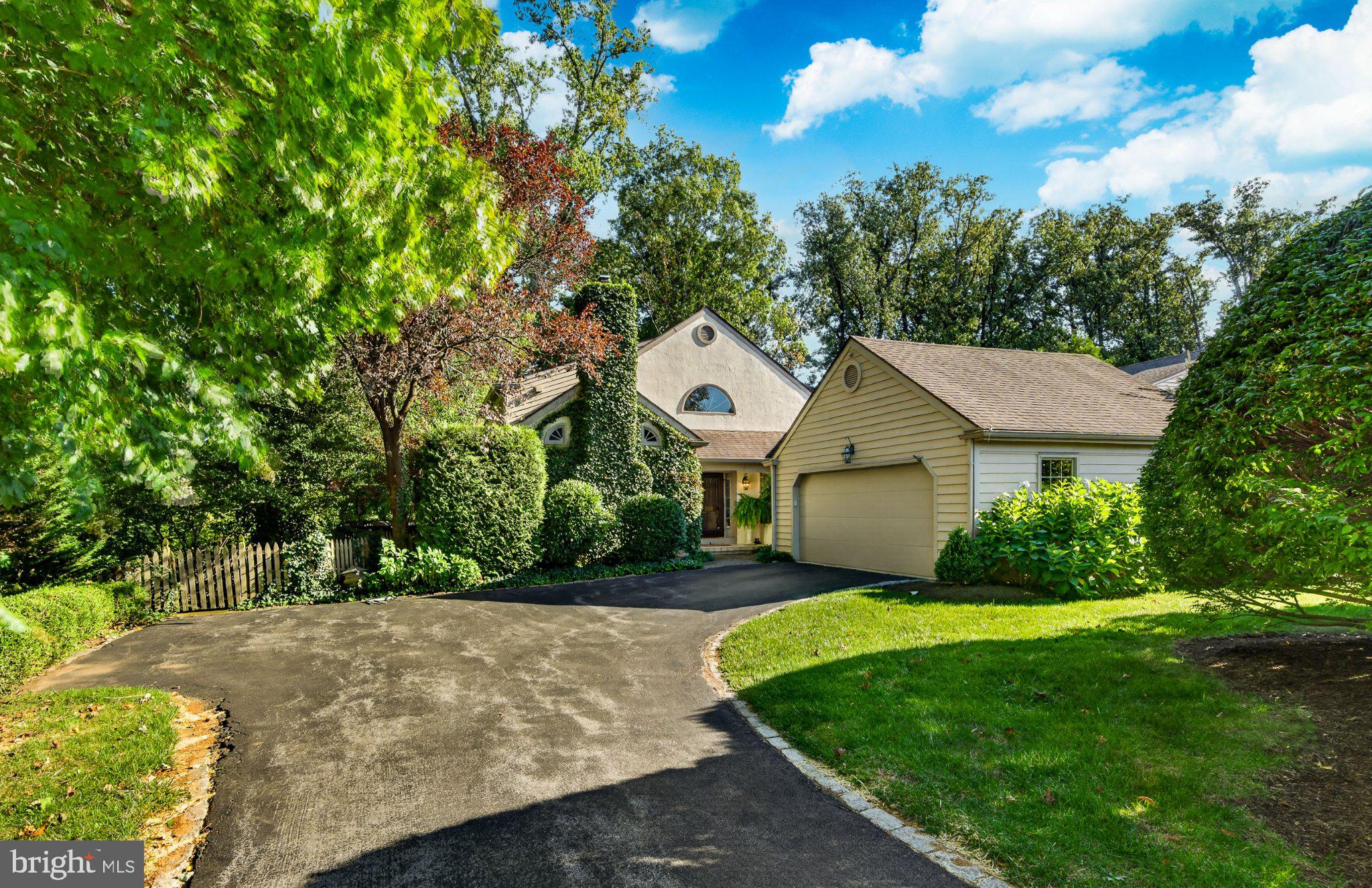 Set against a backdrop of stunning wood views, this 3-bedroom, 3.5-bath home offers a rare combination of comfortable living and thoughtful updates throughout. The first floor primary suite is a standout, paired with beautiful hardwood floors that run throughout the entire level. The remodeled primary bath feels like a retreat, with a walk-in shower, two furniture-style vanities, and generous closet space. The kitchen is equally impressive — a chef's dream with a Wolf gas cooktop, double ovens, and a huge marble island that anchors the space. Step out back to a rear deck overlooking the lower yard, or head down to the walk-out lower level, complete with a full bath and endless potential — an extra bedroom, a second living space, or whatever fits your needs.Additional features include a sprinkler system and a two-car garage with epoxy flooring. And there's so much more to discover in person.Come enjoy this lovely neighborhood and its perfect location close to downtown Wayne, Villanova University, and access to 476.