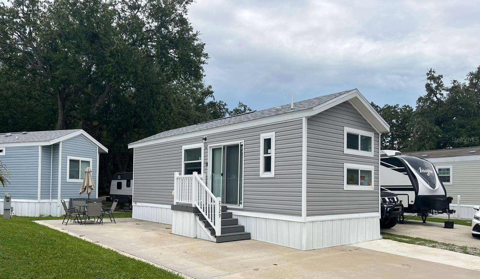 Welcome to this charming, fully furnished mobile home located in Mill Creek RV Community! Ideally positioned near the community pool and recreation area, this home offers comfort, convenience and a relaxed Florida lifestyle. It may be suitable as a personal getaway, short-term rental or long-term rental, subject to community approval and rental guidelines. Conveniently located near shopping, dining, major roadways and Central Florida attractions. The home is being sold furnished and is ready for its next owner. Land is leased and not included in the sale.Water included with the land lease. Financing available to those who qualify.
