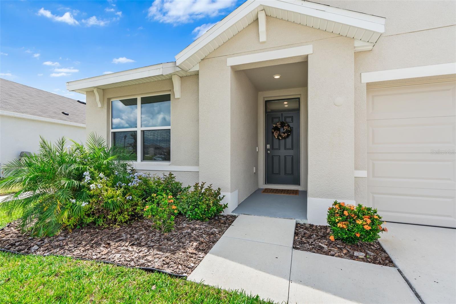 Better than builder — with $18,935.55 already invested in upgrades, so you don’t have to.Built in 2024, this refined 3BR/2BA DR Horton Aria offers 1,690 sq ft of move-in-ready living on an oversized premium lot in Westgate at Avalon Park West. Positioned with peaceful green space directly in front, the home enjoys added privacy and an open, unobstructed feel rarely found in large new construction developments.Thoughtfully elevated beyond standard builder finishes, improvements include luxury vinyl plank flooring in all bedrooms, Kohler kitchen sink upgrade, whole-home water softener with reverse osmosis system, modern designer ceiling fans, fully fenced backyard, garage overhead storage system, and attic plywood flooring for enhanced storage capacity and so much more. Ask for the full list of improvements. Skip the construction timeline, post-closing upgrade costs, and uncertainty — this nearly new home delivers the efficiency and clean lines of new construction with premium enhancements already complete.Residents enjoy resort-style amenities including three pools, hot tub, splash pads, dog parks, pickleball courts, playgrounds, clubhouses, and year-round community events. Convenient to Downtown Avalon Park West and just minutes from The Shops at Wiregrass, The Krates at the Grove, and Tampa Premium Outlets, with easy access to SR 54, I-75, and I-275.