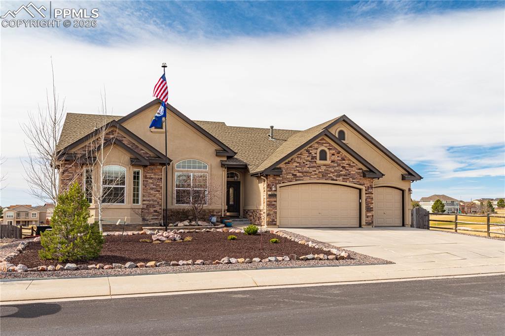 Welcome to a stunning ranch-style home in the highly sought-after Meridian Ranch community. Offering 5 bedrooms, 4 bathrooms, and 4,662 square feet, this home is designed for comfortable main-floor living with exceptional space for entertaining. Perfectly positioned backing to the golf course near the 13th hole, you’ll enjoy breathtaking, unobstructed views of Pikes Peak and the entire Front Range—with no neighbors on the north side for added privacy. Inside, the open layout is highlighted by a double-sided fireplace connecting the living room and office, where you’ll also find built-in shelving and inspiring mountain views. The primary suite, living room, and office all capture stunning views of Pikes Peak, creating a truly special everyday backdrop. The main level features a spacious primary suite with a luxurious 5-piece bath, while the walk-out basement expands your living space with a massive family room, complete with its own fireplace. One of the basement bedrooms serves as a junior suite with a private bath—perfect for guests or multi-generational living. Enjoy Colorado outdoor living at its finest with a multi-level deck overlooking the golf course and mountains. The home also includes a 3-car garage and low-maintenance front landscaping for easy upkeep. This is a rare opportunity to own a beautifully appointed home with unmatched views, privacy, and space in Meridian Ranch.