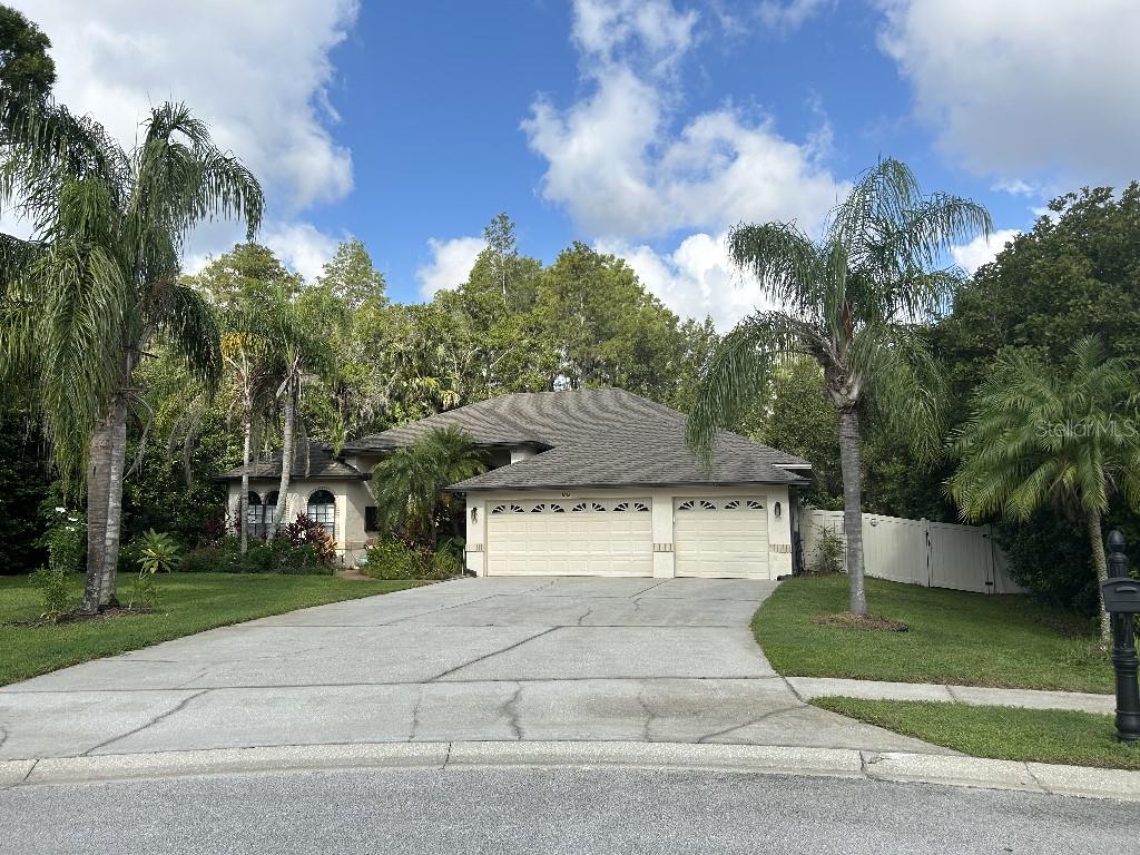 Serene lake, great location, beautiful private lot on cul-de-sac, open floor plan made for entertaining!  This house has it all!  Rural living in Lutz, with suburban Carrollwood close by.  Just 20 minutes to Tampa airport. Your breath will be taken away by the view when you walk in the front door! The large, remodeled chef's kitchen has 3 ovens, quartz countertops, walk in pantry.   There are vaulted ceilings throughout, 14 feet in living room, with twelve feet of slide away glass doors that open the living room to the pool/lanai.  The extra-large master suite has 2 walk-in closets, a massive en-suite bathroom with twin vanities, Jacuzzi tub and walk in shower.  There is also a separate bonus office space off the master.   Part of the large lanai covers the tv/bar area to watch sports from your swimming pool, overlooking the lake.  Put everything in your 3+ bay garage.  Even more in your 10x15 tough shed.  Large lot has oaks, palms, magnolias and fruit trees. No CDD or HOA.  Not in flood zone. Imagine sitting, watching the sunset over your dock.  All Buyer's, Agent's welcome.  By appointment only.