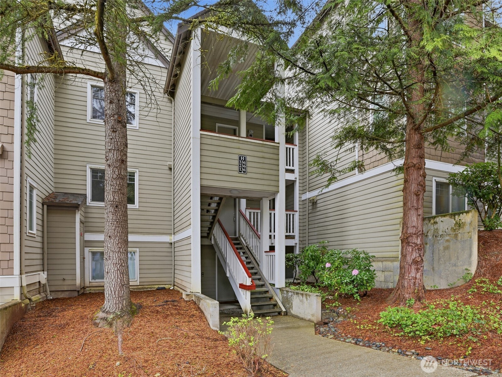 Discover the comfort and convenience of this Issaquah condo! This ground-level 2-bedroom, 2-bath residence features a functional and inviting layout. The updated kitchen offers abundant cabinetry and generous counter space, flowing into a welcoming open concept living room with a wood-burning fireplace and an adjacent dining area. Both bathrooms have been tastefully updated, and the home includes two well-sized bedrooms along with a walk-out patio complete with a storage closet.The location is highly convenient, providing easy access to shopping, restaurants, theaters, hiking trails, public transit, the freeway, and more. Assigned covered carport parking is located just steps from the unit, with additional visitor parking nearby. Situated within the highly regarded Issaquah School District. Don’t miss this opportunity!
