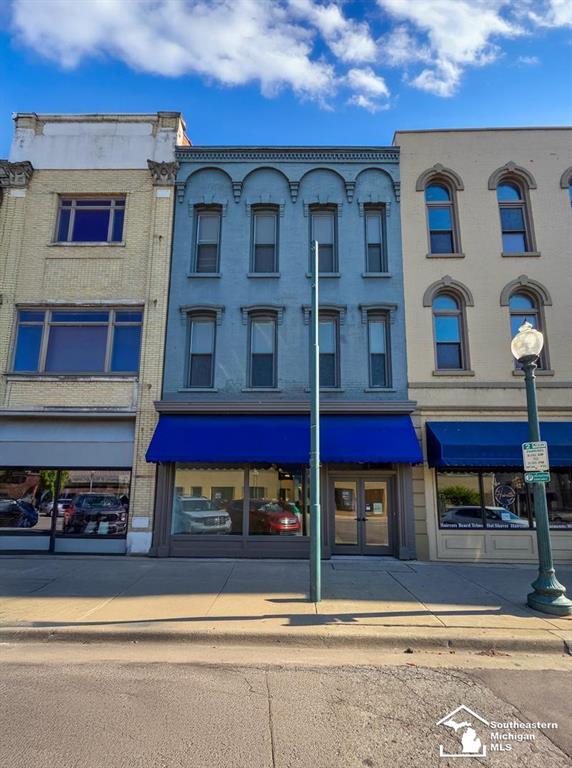 Live and Work in Historic Downtown Monroe "“ 8 E. Front Street Upper-Level Residence "“ Over 2,800 SF of Furnished Living Space Experience the best of downtown living in this expansive two-story apartment nestled in the heart of Monroe's vibrant business district. With over 2,800 square feet of beautifully maintained space, this residence offers a rare blend of style, comfort, and convenience.   Home Features: Two Spacious Bedrooms: Each features a private ensuite bath with shower and an oversized walk-in closet. Flexible Bonus Room: Large main-level bonus room can be used as a third bedroom, home office, or additional living space. Gourmet Kitchen: Equipped with a stove, microwave, dishwasher, disposal, trash compactor, and an oversized walk-in pantry. Generous Living Areas: Main level includes a living room, dining area, walk-in guest closet, and a half bath. Private Laundry: Washer and dryer in a dedicated laundry room on the bedroom level. Comfort Features: Very high ceilings, high-efficiency furnace and central air conditioning. Dual Entrances: Private front and rear access for added convenience and security. Timeless Finishes: Gleaming hardwood floors throughout add warmth and character.   Main-Level Commercial Space "“ Prime Downtown Business Opportunity. Located on the main floor of this charming downtown building is a well-maintained, 1,730 square foot commercial space, perfect for office or retail use. Positioned in the heart of the Downtown Business District, this location offers exceptional walkability (score of 81) and visibility. Commercial Highlights: Ideal Location: Just steps from the Courthouse, City Building, County offices, and popular downtown cafes. Adjacent to Jones For Men: Benefit from foot traffic and neighboring retail synergy. Functional Layout: Bright and professional interior with hardwood floors and excellent street frontage.   Bonus Basement: Very clean three-quarter basement -ideal for inventory storage or back-of-house operations. Versatile Use: Suited for professional office, bo