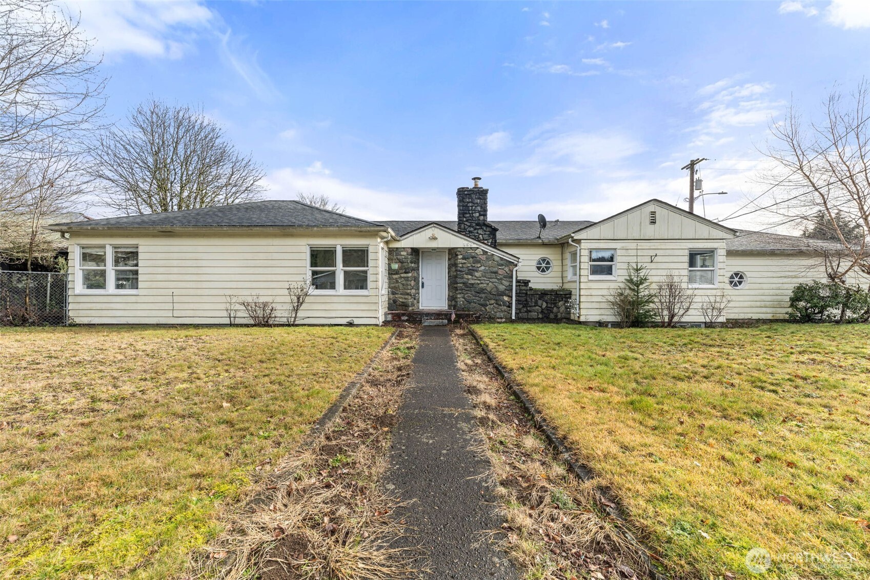 Set on a sunny corner lot, this 1,410 sq ft, 3-bedroom, 1¾-bath home offers space, functionality, and plenty of opportunity to make it your own. While the home reflects its original charm, it’s clean, solid, and move-in ready. Perfect for those who want to live comfortably now and update at their own pace. Enjoy the convenience of an attached two-car garage plus a large two-bay carport, ideal for extra vehicles, hobbies, or weekend projects. The fully fenced backyard features an east-facing patio provides comfortable morning sun, but offers shade in the hot afternoons, perfect for summer BBQs, morning coffee, or letting pets roam freely. Inside, you’ll find a practical, sprawling layout, an unfinished basement offering storage or future expansion potential, and all appliances included—yes, even the washer and dryer. A great opportunity for buyers looking for value, space, and a home with room to grow in both style and equity.