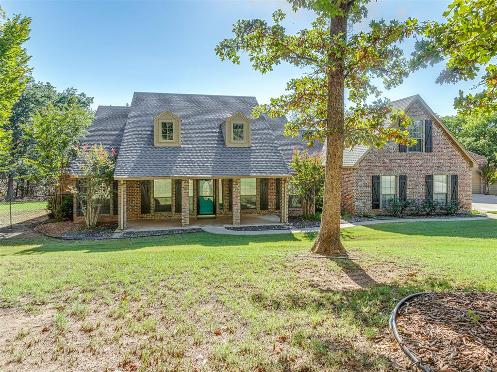 Welcome to 10461 Ridge View Dr in this nice little pocket where you get both Edmond Schools but Logan County taxes! Seller offering $14,000 towards closing costs or rate buy down!! This one owner, custom built home is situated on 2.75 acres full of trees, and has everything you could possibly need! The main home is complete with 4 bedrooms, 3.5 bathrooms, an office (or formal dining space) and a large bonus room plus 3 car garage. The large shop allows for 2 more parking spaces - or just an area for your boat, tools, wood shop - you name it, PLUS a full apartment (569sqft mol) complete with a full kitchen and full bath. The apartment even has a separate entrance to allow for complete privacy - perfect for in-laws, adult children, or guests. This home has been so meticulously cared for and the pride in ownership shows everywhere from the fresh paint, new roof, new hvac, new hot water tanks, and more. Come and relax on this enormous back patio amongst the trees, or go fishing in the shared pond!