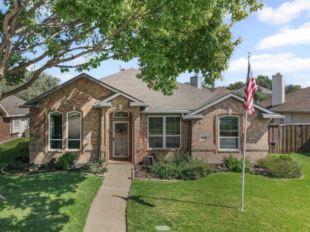 Immaculately maintained 4-bedroom home with dedicated office, 2 full baths, and NO HOA in desirable Lewisville ISD! This move-in ready gem features luxury vinyl plank flooring throughout, a spacious kitchen with granite countertops, ample cabinetry, pantry, and conduction cooktop—all open to a cozy living room with gas fireplace. The private primary suite features a Texas-sized walk-in closet and en-suite bath with walk-in shower. Three additional bedrooms are split from the primary, offering great privacy. Step outside to a covered patio, perfect for entertaining—complete with a hot tub, TV setup, lush landscaping, tranquil waterfall, and a board-on-board privacy fence. Rear-entry 2-car garage includes a mini-split HVAC, ideal for storage or workshop use, plus an extra parking pad. Don’t miss your chance to call this stunning home yours—schedule a private showing today, and start packing!