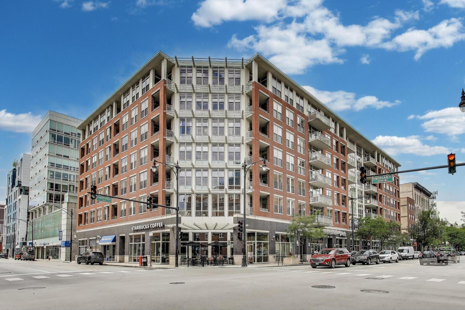 Exceptional West Loop corner penthouse -- centrally located to the best of West Loop and walkable to Fulton Market, Downtown, Metra station, and CTA. Easy walk to Bartelme Park and Skinner Park. A 5-block drive to both I90 and I290. Great views of West Loop / downtown from all rooms. Floor-to-ceiling windows allow tons of natural light and highlight the penthouse experience. Remodeled by the current owner. No expense was spared. Generous bedroom sizes, open layout. Bedrooms located away from the living space -- making this oversized 2400 sqft condo live like a single-family home. Walk-in pantry, hardwood flooring, grilling balcony off kitchen and high ceilings. The kitchen features contemporary cabinets, high-end appliances and an oversized kitchen island for storage, prep and entertaining -- open to the living/dining area. Primary bedroom suite features a luxurious ensuite bath and a custom designed and appointed walk-in closet (large enough for 2 persons to share). Separate glass enclosed shower, huge whirlpool tub and double vanity highlight the spa-like bath. The primary bedroom is spacious, light-filled and features beautiful views of West Loop. The 2nd bedroom is generous in size, features tons of closet space, built-in shelving, and a murphy bed. Extra half bath near the entryway for guests/entertaining. Two balconies, two fireplaces and a separate laundry room with door. Surround sound speakers throughout. Original 3rd bedroom converted to an entertainment space and opened to the living/dining/kitchen (and can be added back). Additional huge 9'x8' private storage room conveniently located in the garage. Premium extra wide parking space inside heated garage (included). Well-equipped exercise room and spacious outdoor common deck round out the amenities. Starbucks retail located in the building.